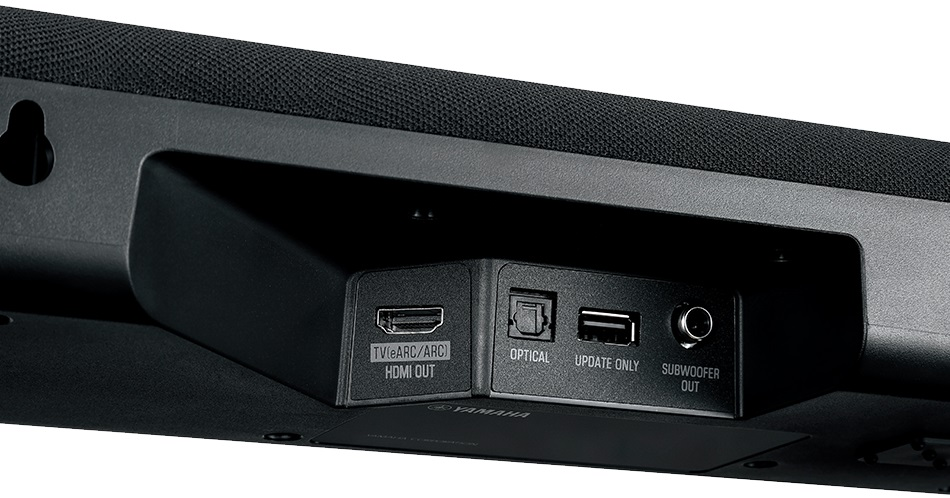 Zbliżenie tyłu soundbaru z portami HDMI, optycznym, USB i subwooferem.