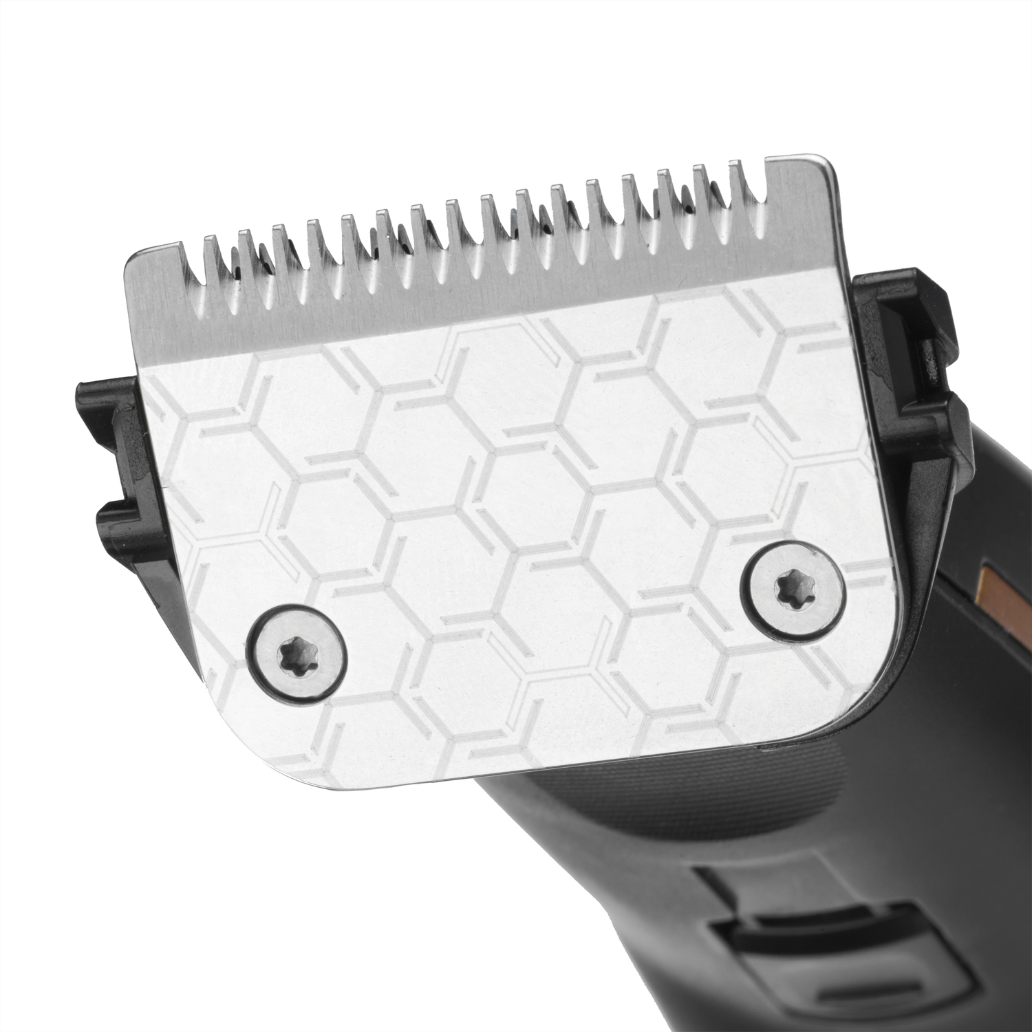 Close-up of a hair clipper blade. Silver blade with detailed cutting teeth.