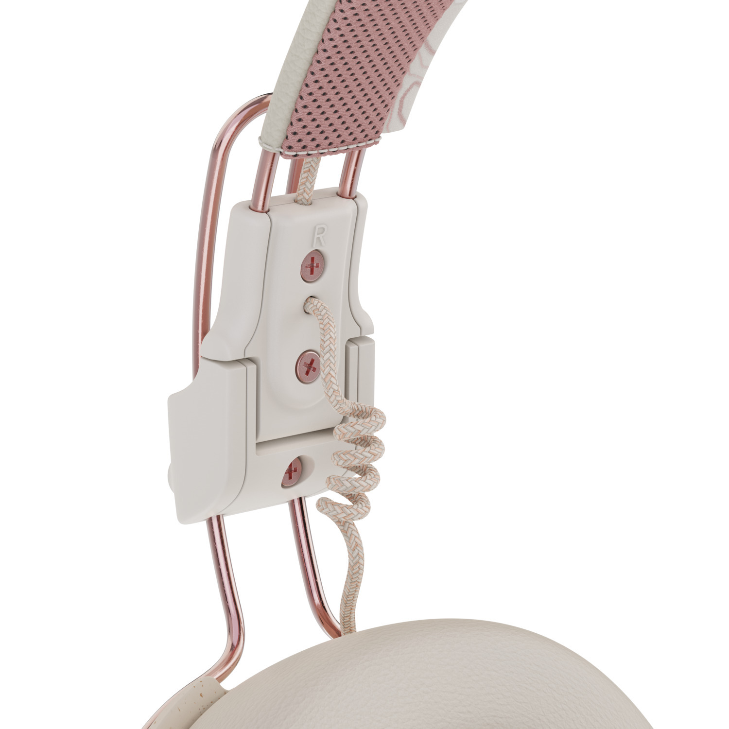 Gros plan des points de connexion d'un casque. Le casque est blanc avec des accents or rose.