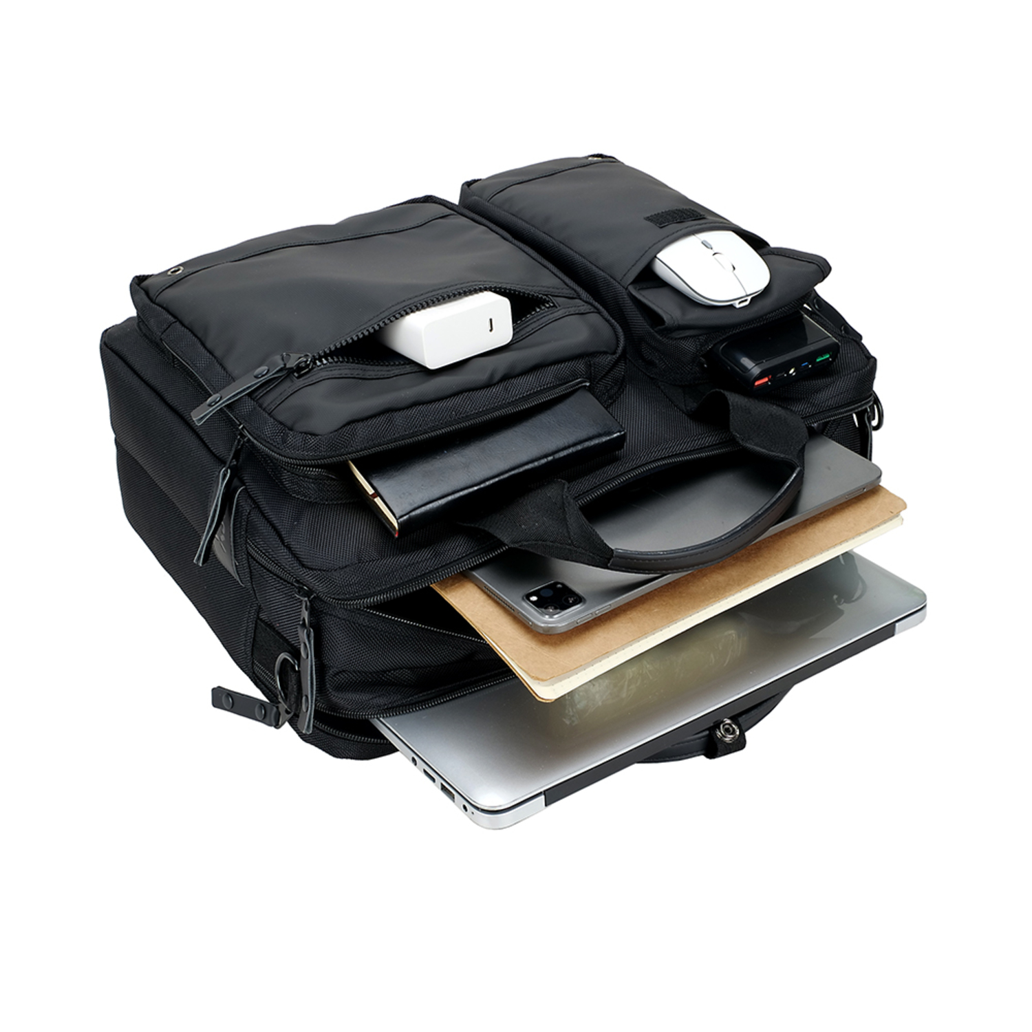 Black open bag with multiple pockets. It holds a laptop, tablet, and accessories.