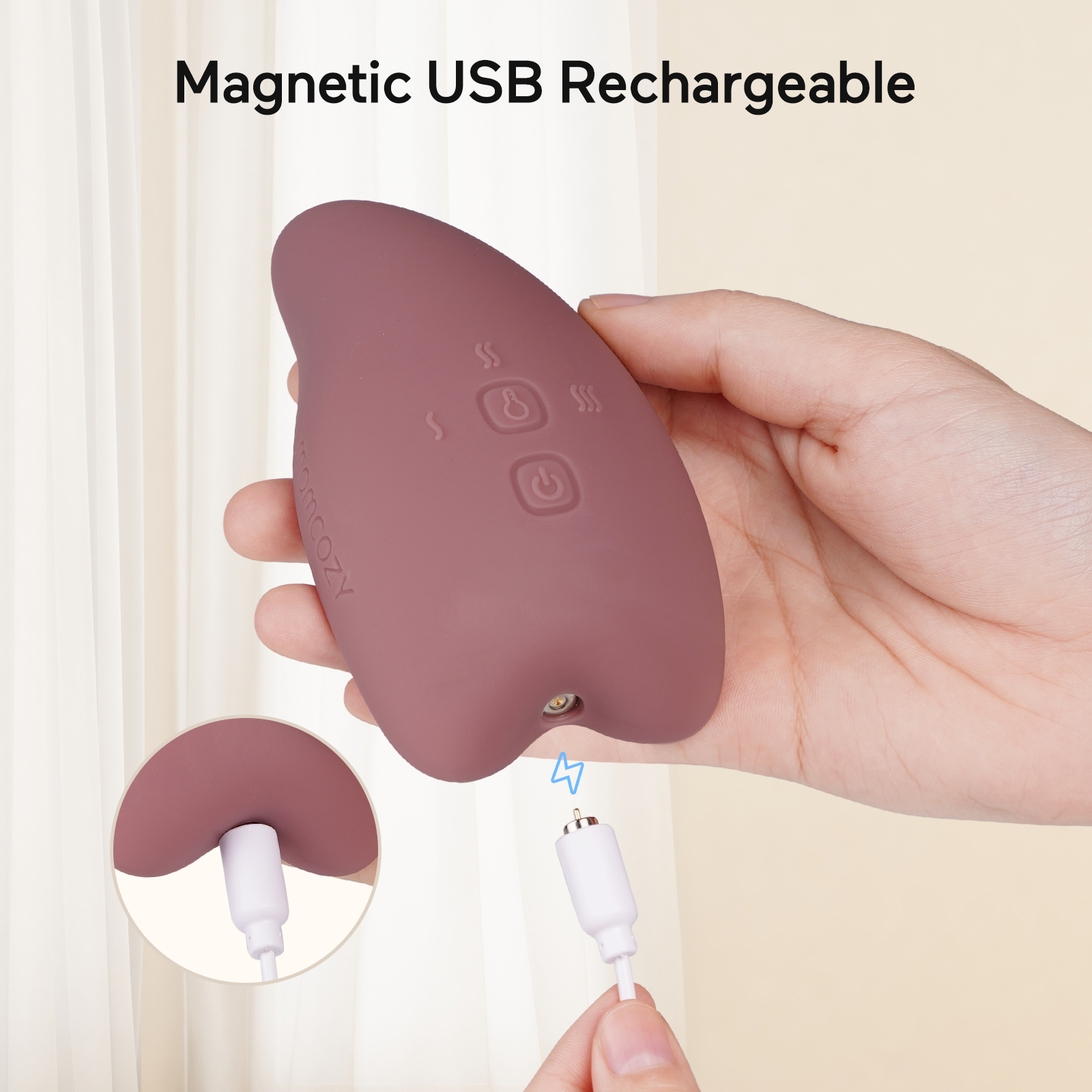 Eine Hand, die ein malvenfarbenes Massagegerät mit einem Ladekabel hält, mit einer Diagramm seiner Funktionen.