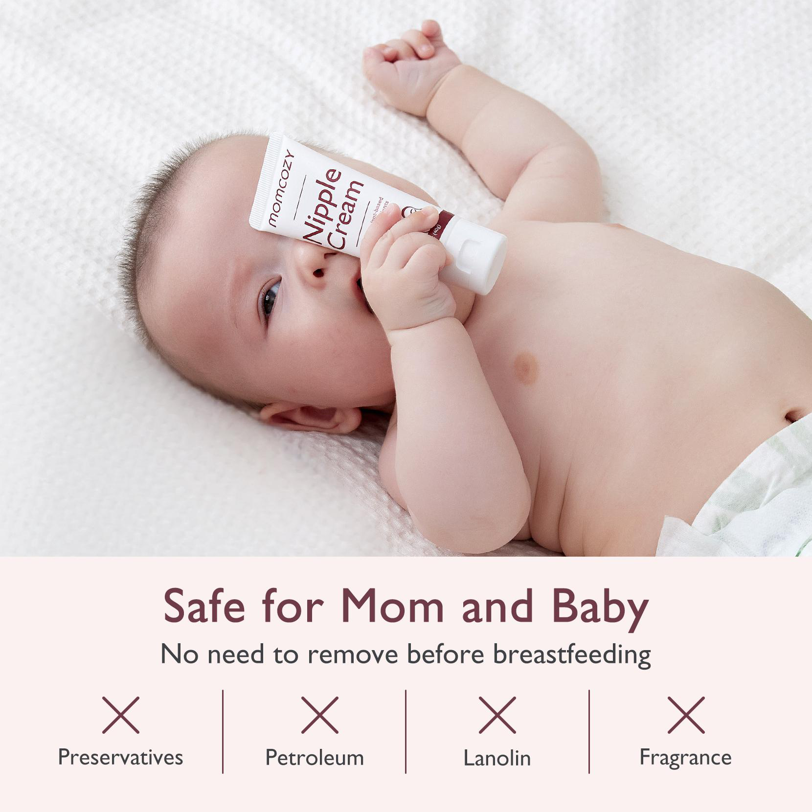 Baby hält Tube Brustwarzencreme, Text über Sicherheit.