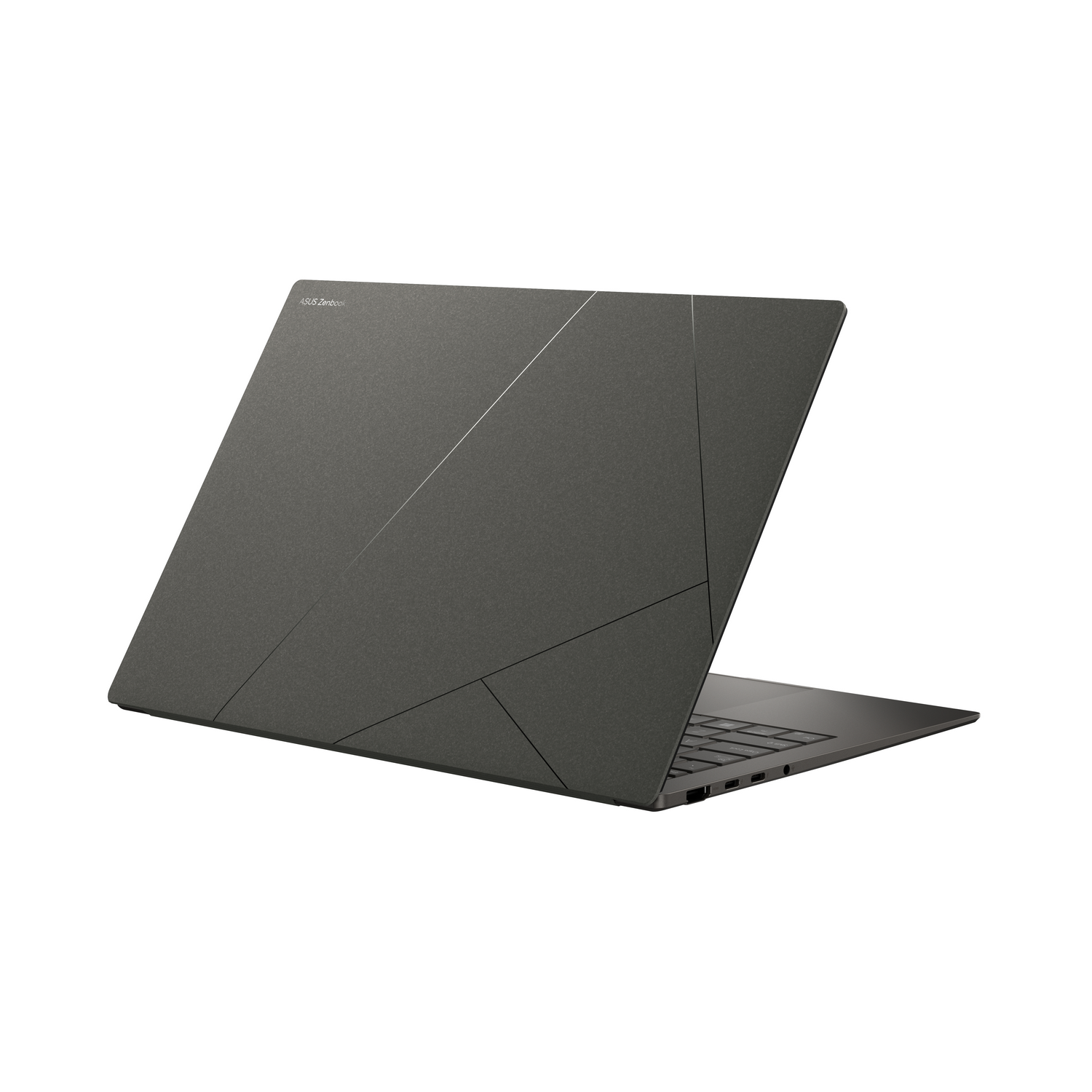 Laptop gris oscuro, cerrado, en ángulo lateral, con un logotipo.