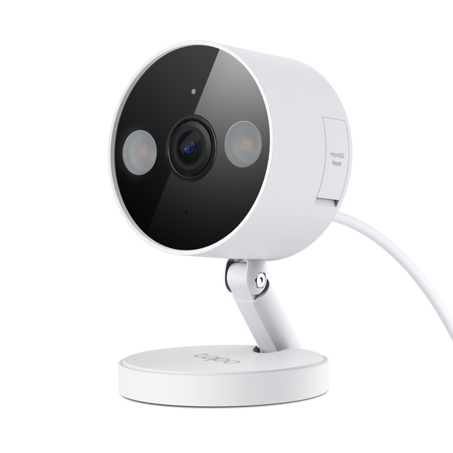 White security camera with black lens and light, angled on a white surface.