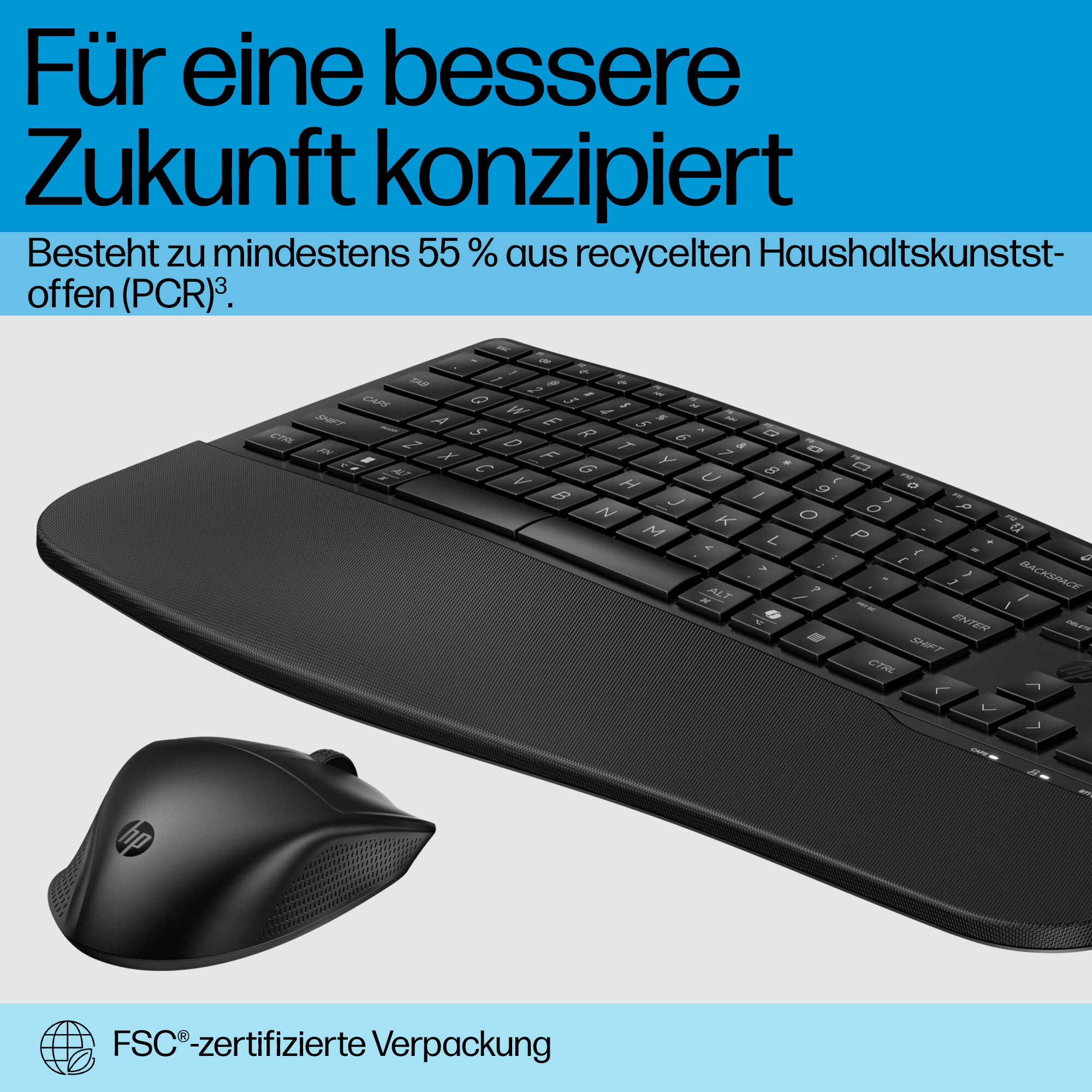 Schwarze Tastatur und Maus. Text: Für eine bessere Zukunft konzipiert. Hergestellt aus recyceltem Material.