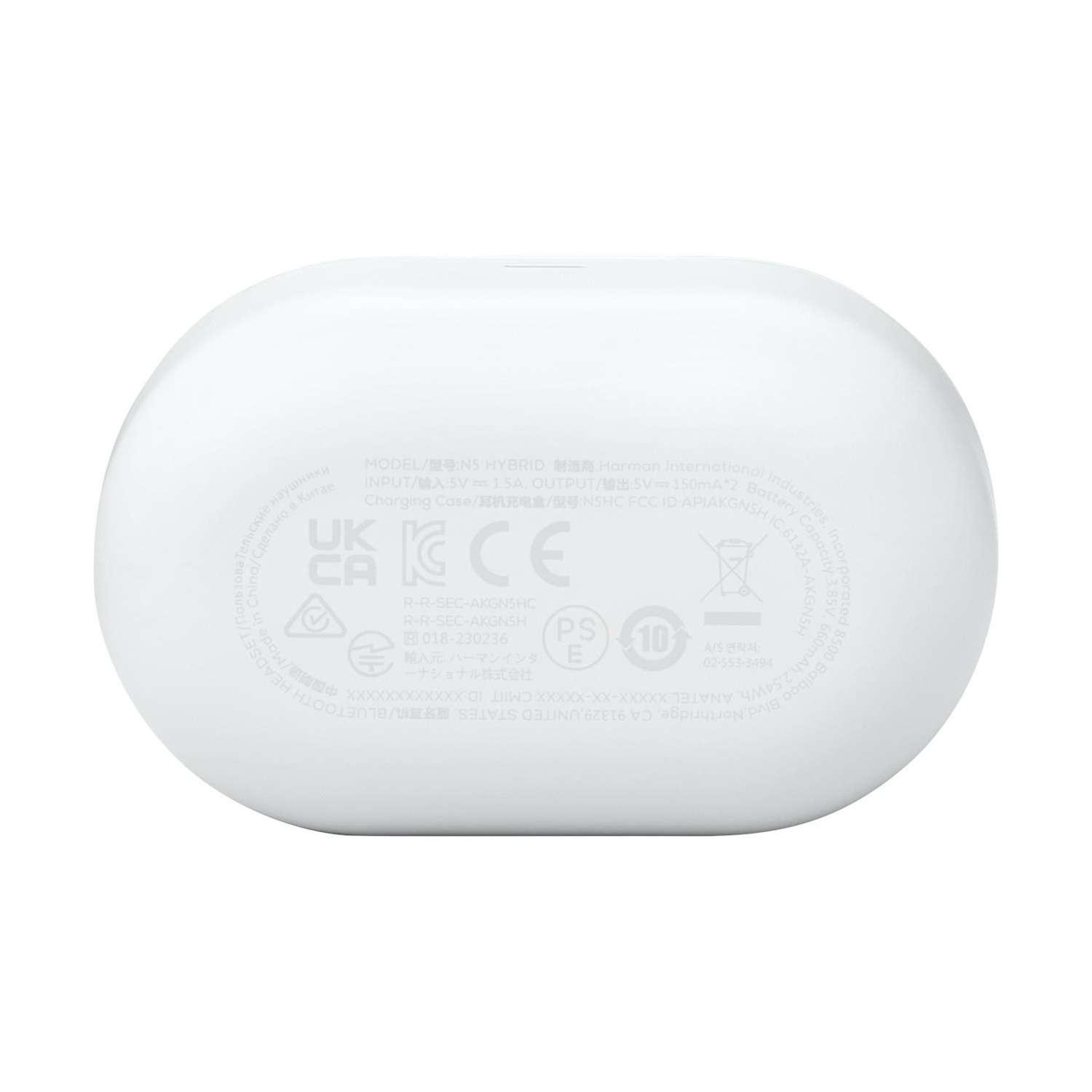 Un dispositivo bianco di forma ovale con etichette e simboli sulla sua superficie, inclusi marchi normativi e testo.