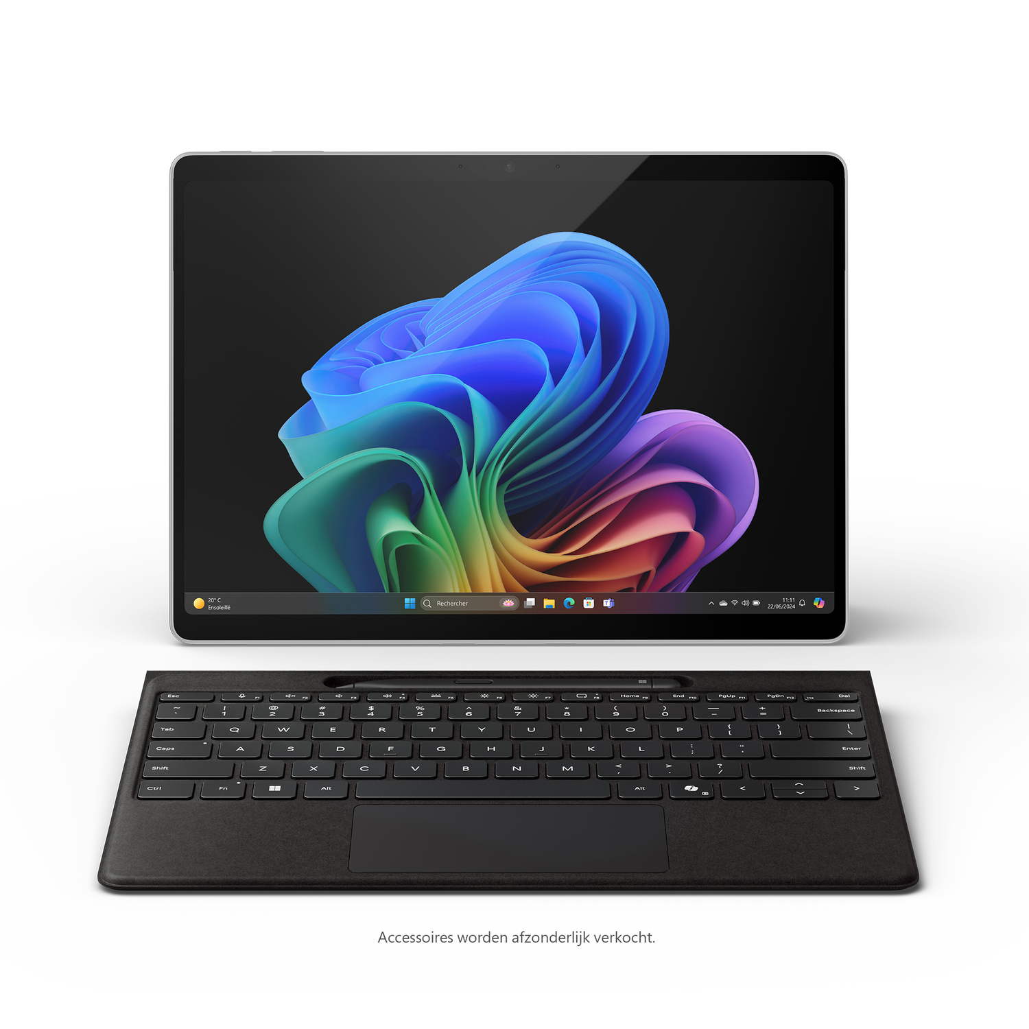 A laptop with a black keyboard below. The laptop displays a colorful, swirling abstract design on its screen.