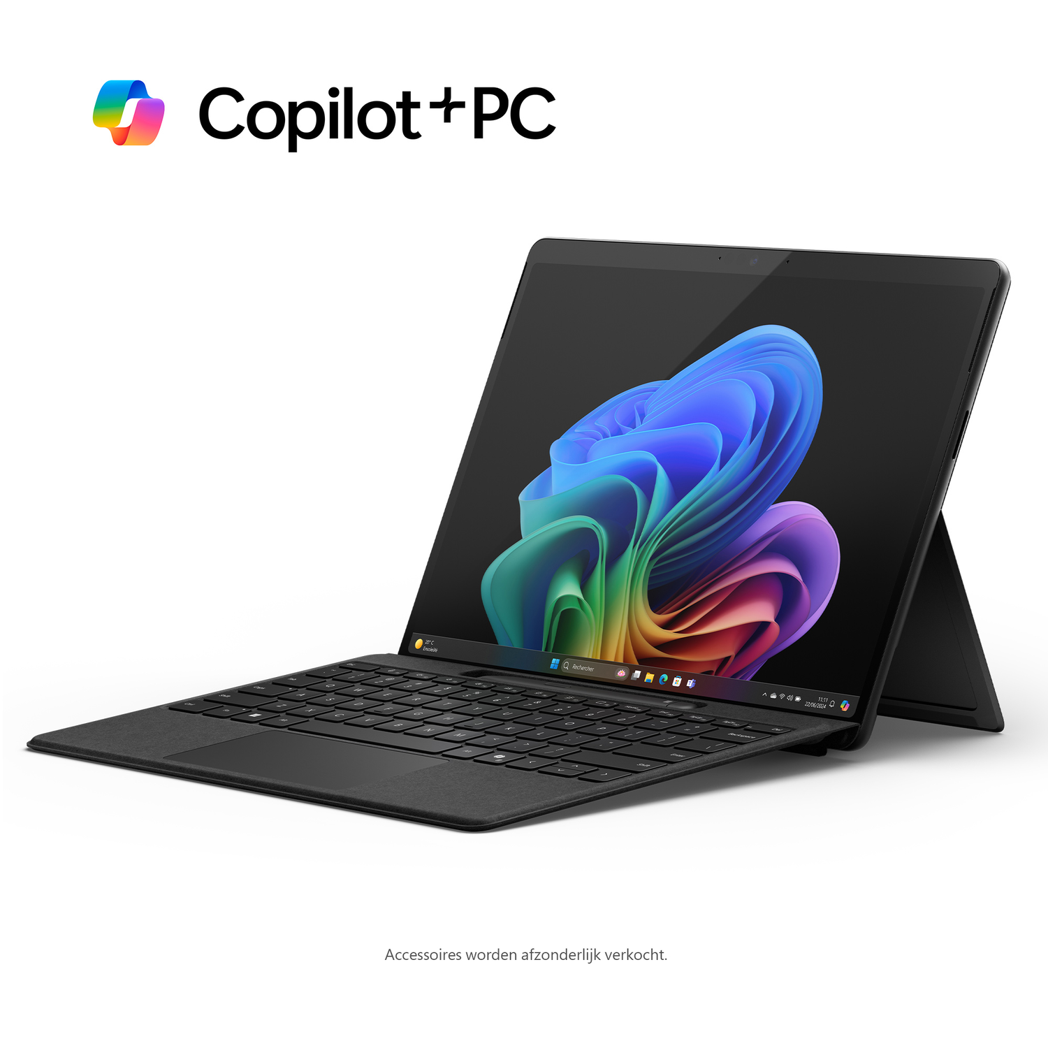 Une tablette noire avec un clavier détachable et un écran coloré, avec un logo "Copilot+PC".