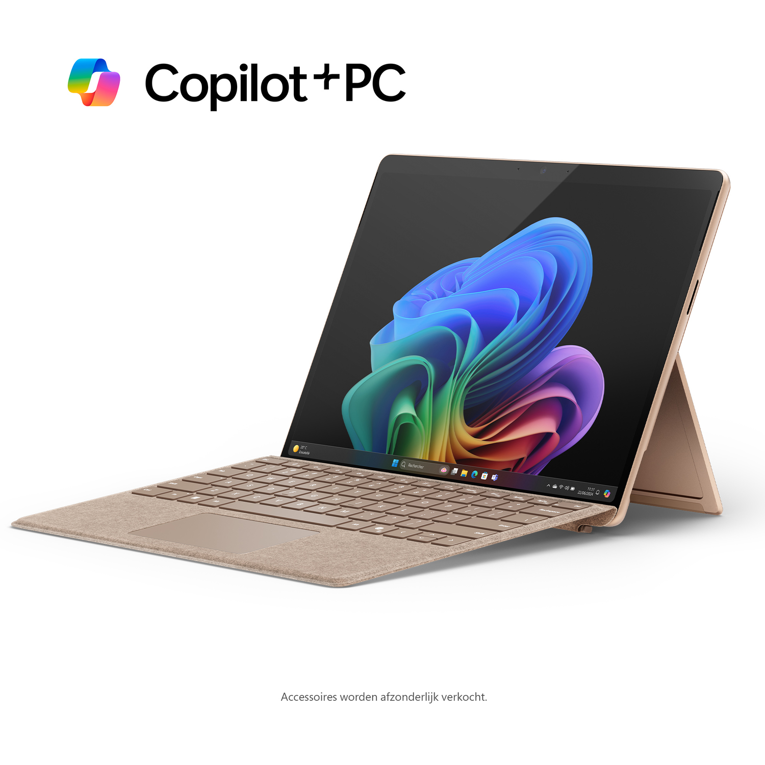 A laptop with a screen displaying a colorful image, on a stand, with a keyboard attached.