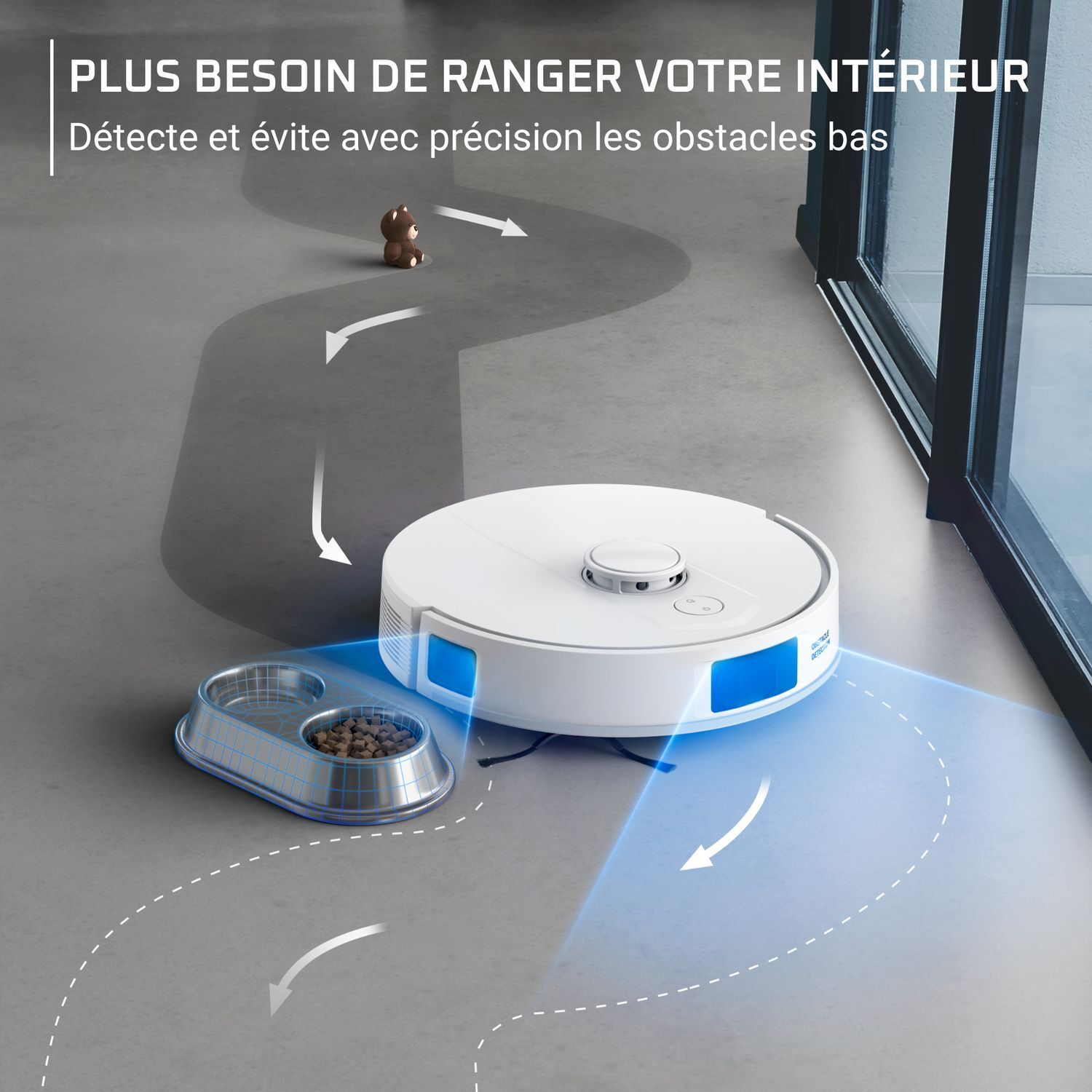 Robot aspirateur blanc nettoyant le sol, suivant un chemin. Un bol de nourriture et un ours en peluche sont également visibles.
