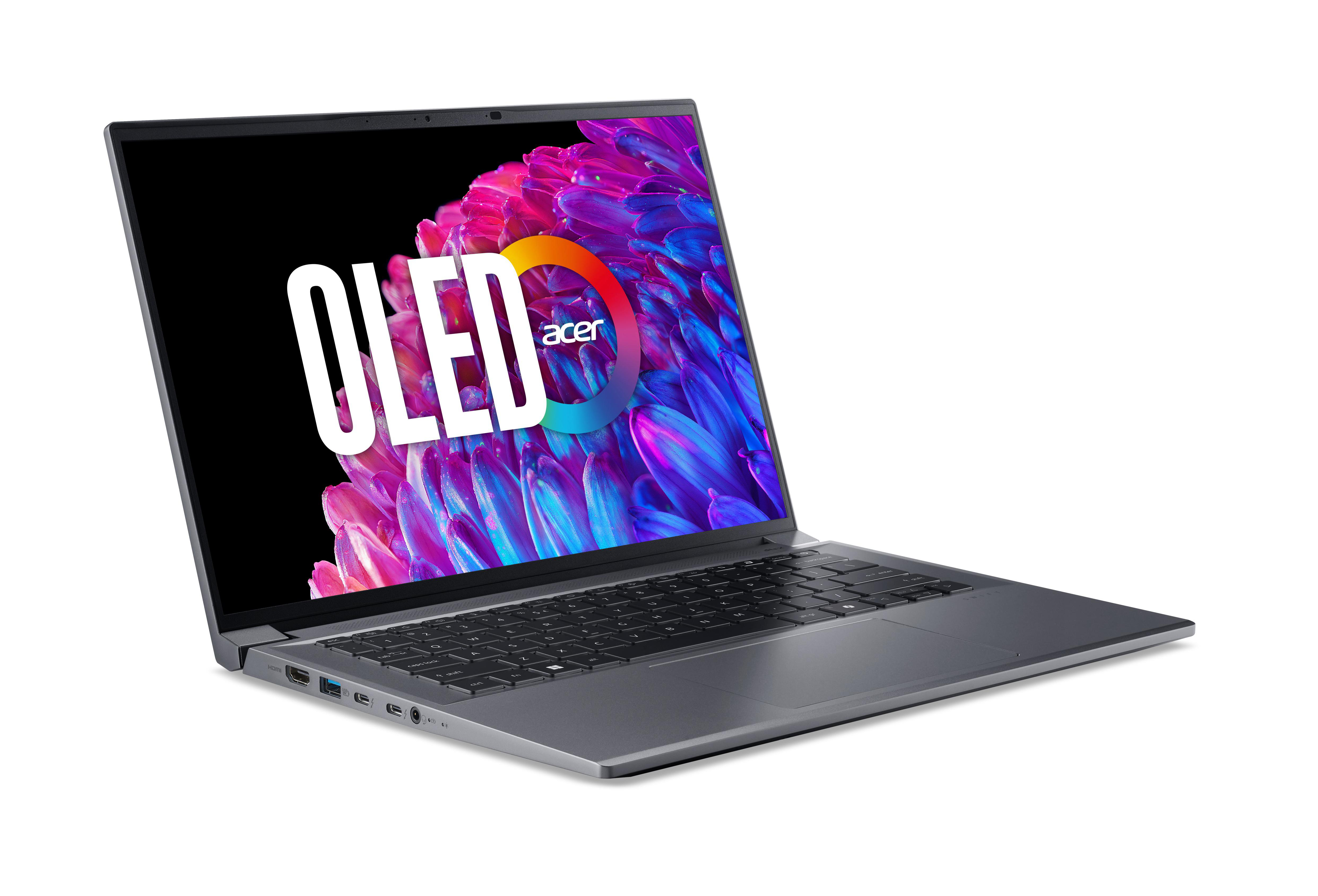 Ein grauer Acer-Laptop mit einem Bildschirm, auf dem "OLED" steht. Die Tastatur ist sichtbar, auf weißem Untergrund.