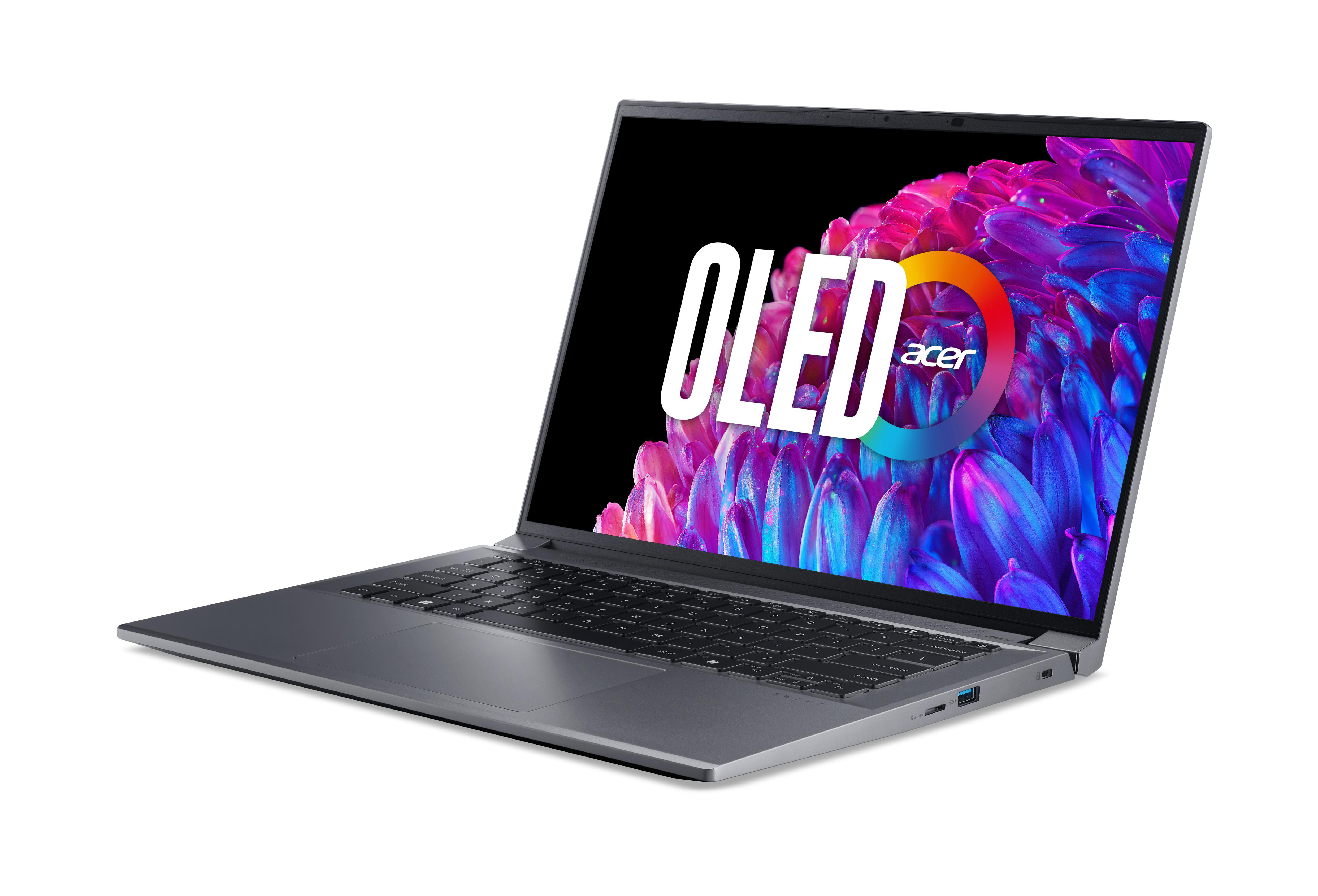 Silberner Laptop offen, Bildschirm zeigt OLED-Logo über farbenfrohem Hintergrund. Weißer Hintergrund.