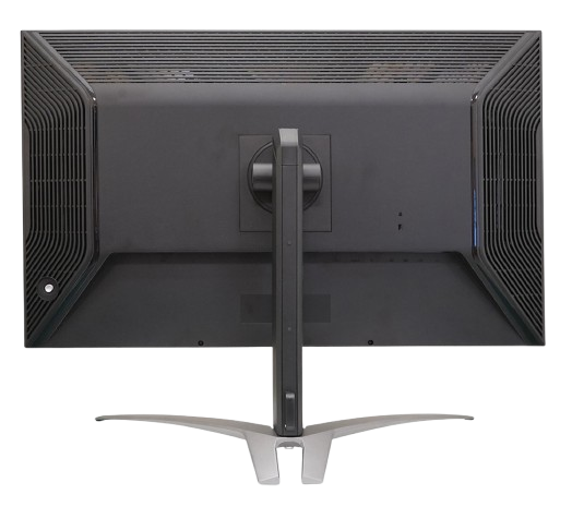 La parte trasera de un monitor de computadora negro, mostrando el soporte, los puertos y las rejillas, sobre un fondo negro.