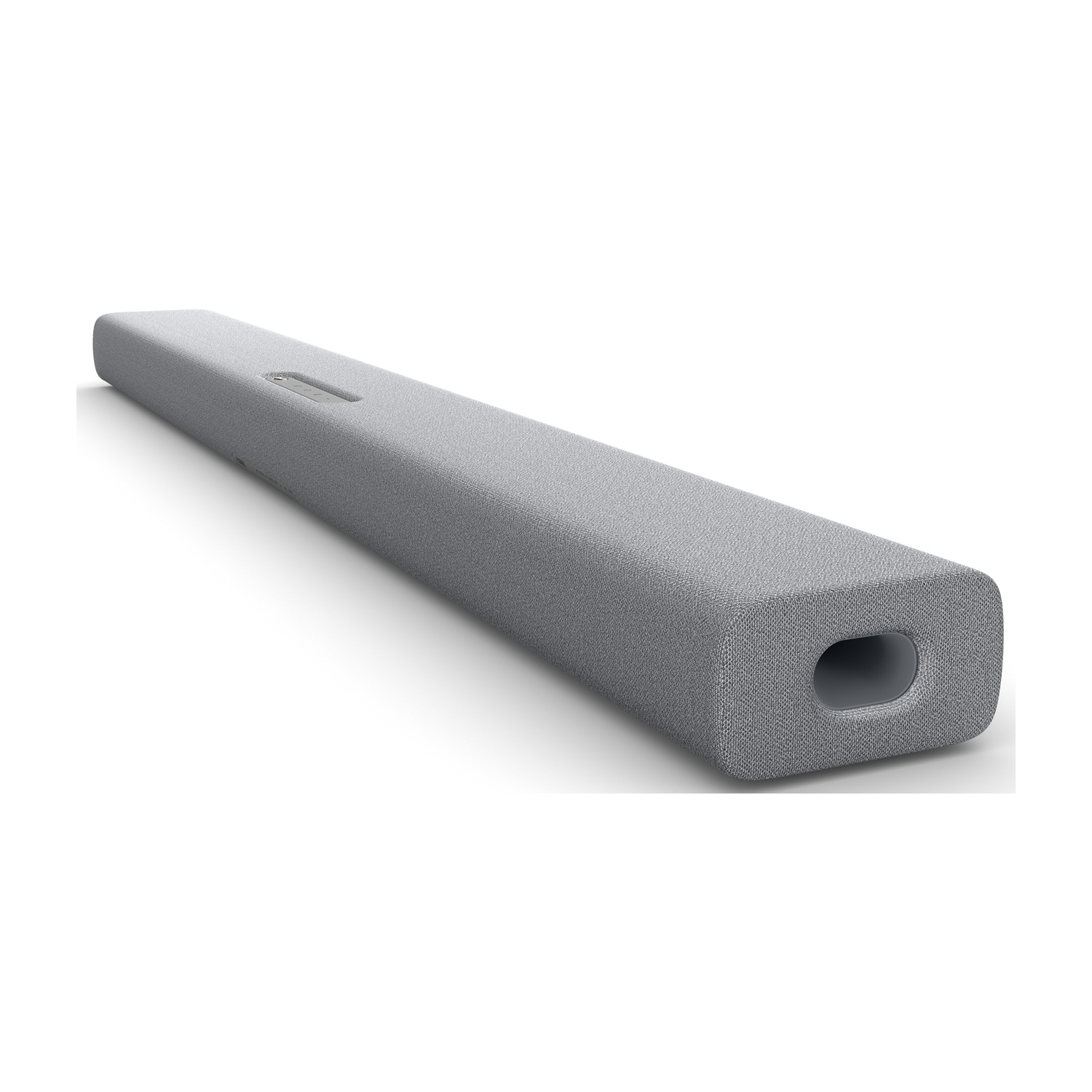 Soundbar grigia con un'estremità arrotondata, su una superficie bianca.