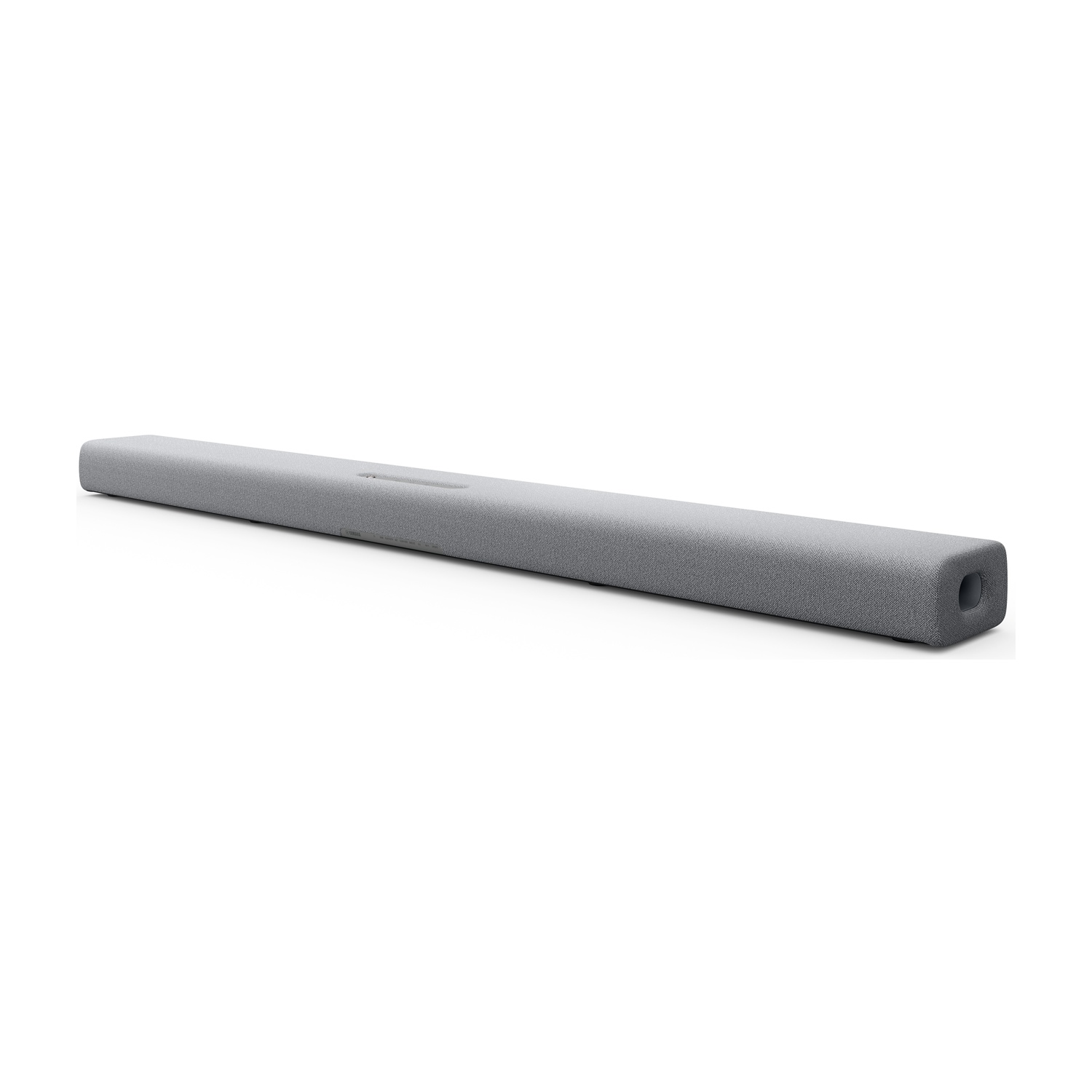 Una soundbar grigia su sfondo bianco. La soundbar è lunga e rettangolare.
