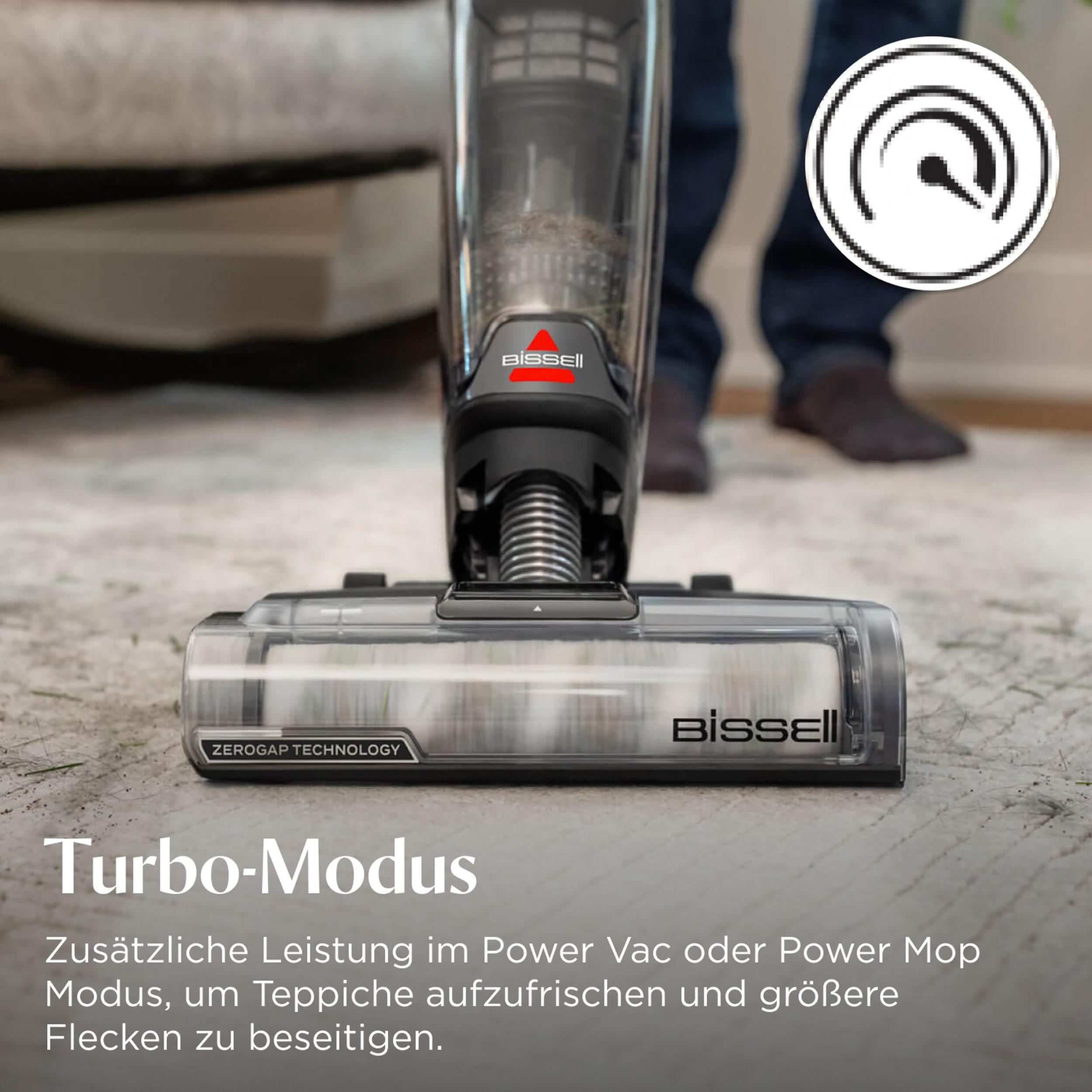 Staubsaugerkopf auf Teppich. Schwarzes und transparentes Design mit Bissell-Logo und Turbo-Modus-Text.