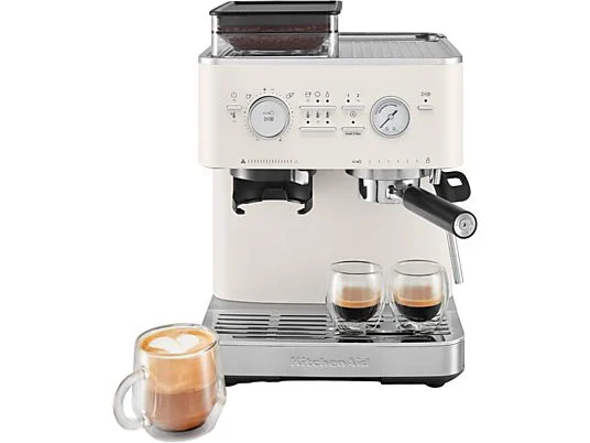 Cremefarbene Espressomaschine mit Latte und zwei Espresso-Shots.