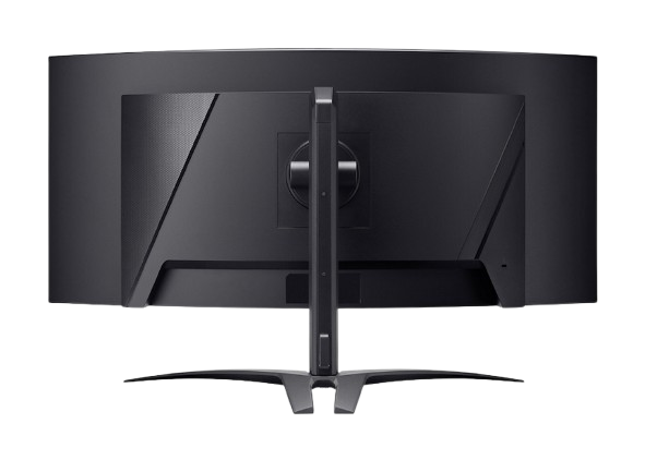 Vista trasera de un monitor de computadora negro curvo con soporte sobre un fondo negro.