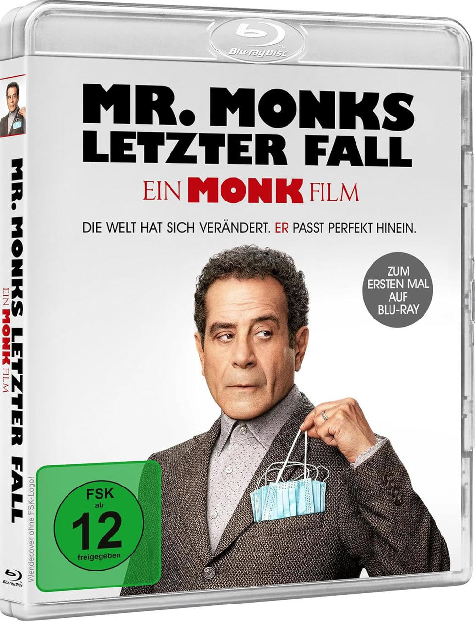 Blu-ray-Disc von 'Mr. Monks letzter Fall'. Das Cover zeigt einen Mann, der Masken hält.
