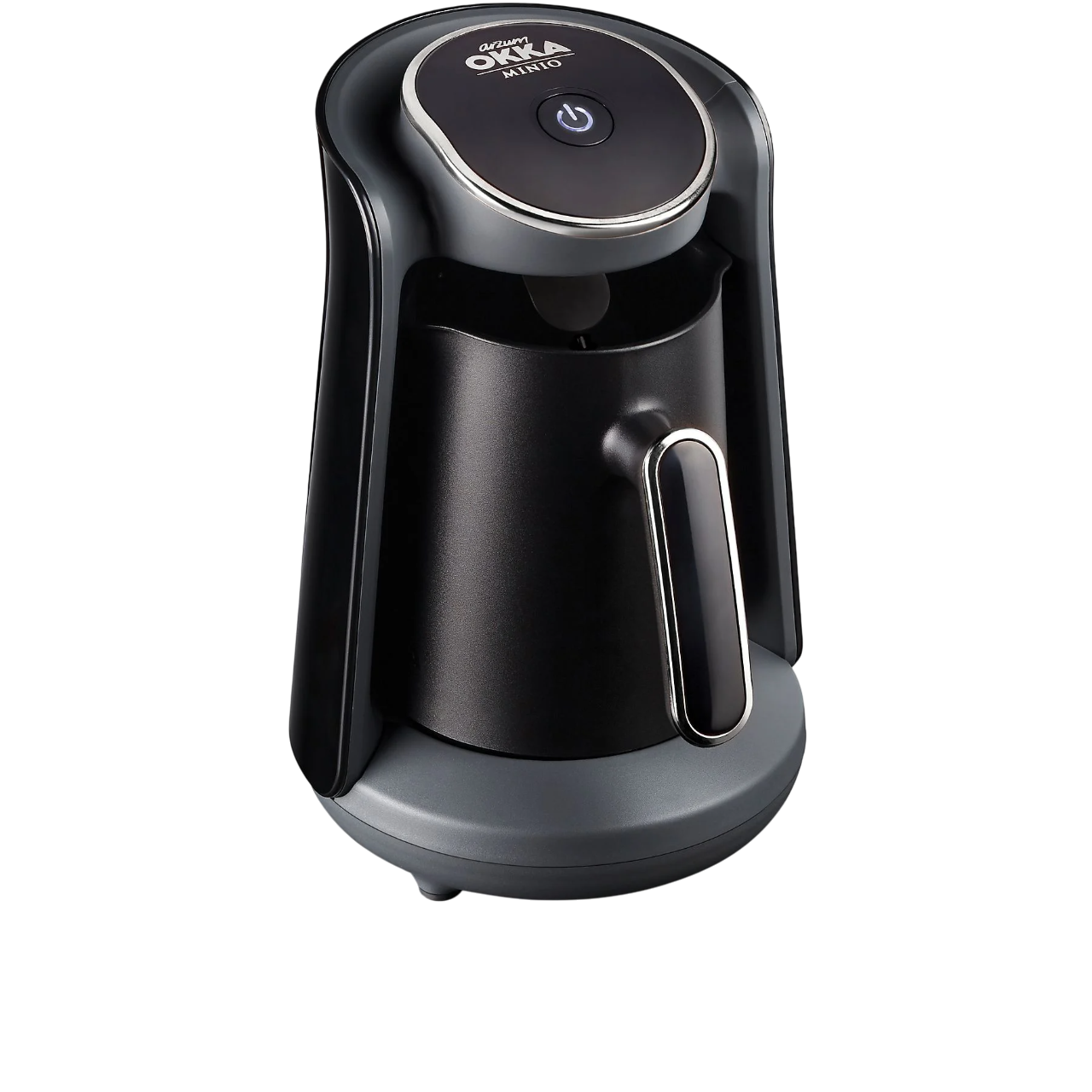 Arzum Okka Minio'dan siyah ve gri kahve makinesi. Siyah bir arka plan üzerinde küçük bir kahve makinesi.