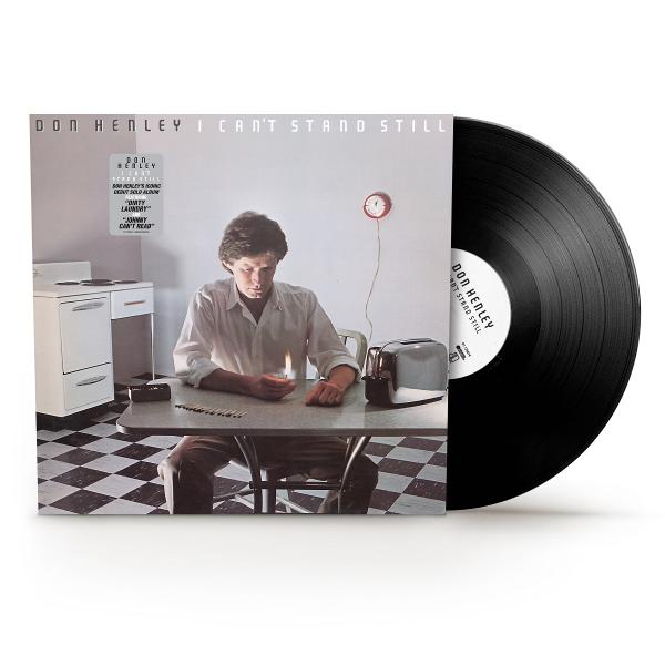 Bakelit lemez Don Henley borítóval. Ül egy asztalnál, öngyújtóval.