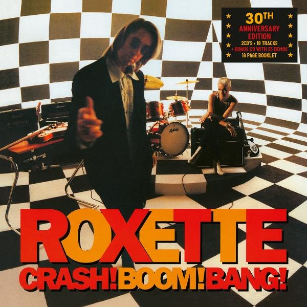 Roxette-Albumcover mit Bandmitgliedern, Schachbrettboden und Albumtitel.