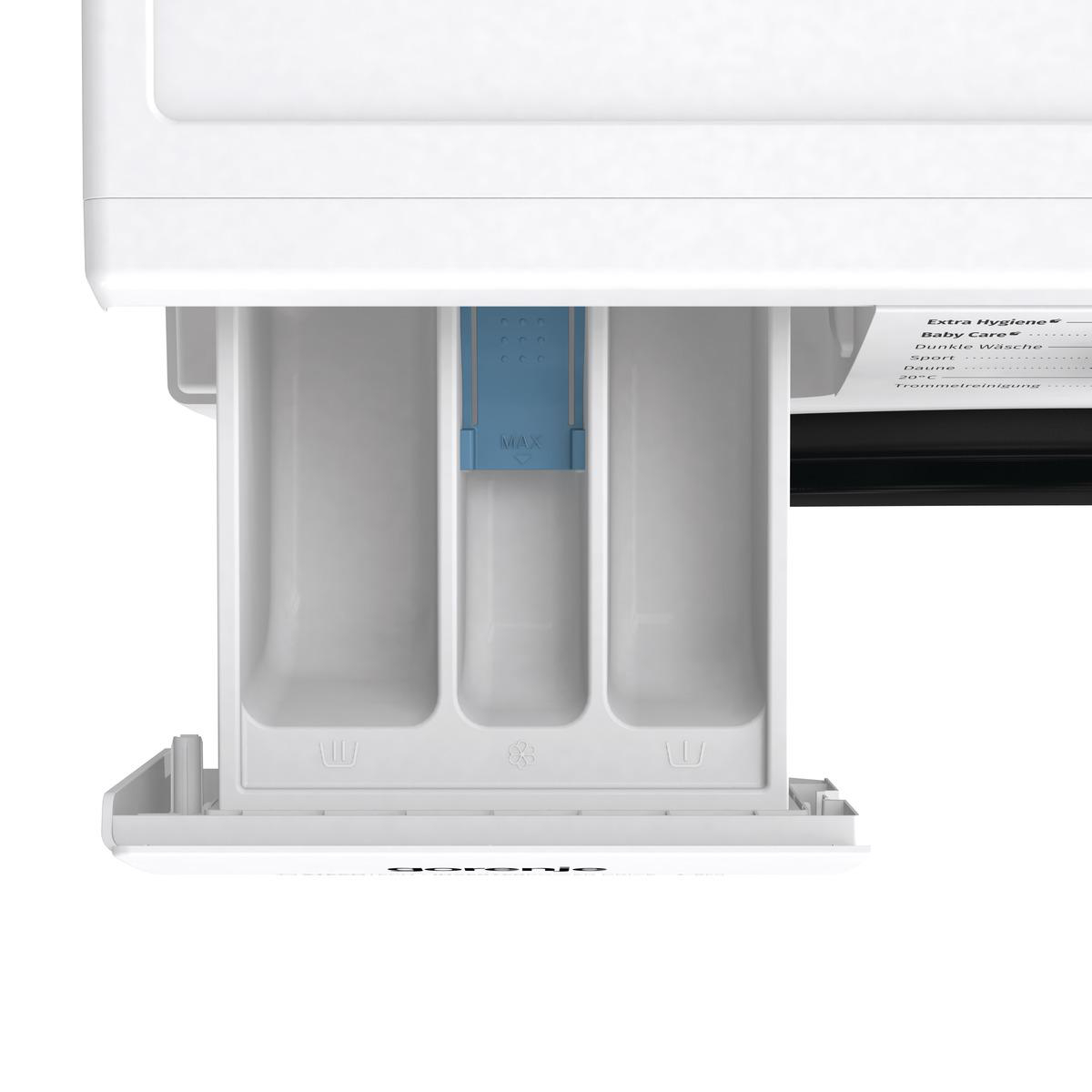 Waschmittelschublade geöffnet, mit drei Fächern. Blauer MAX-Indikator im mittleren Fach.