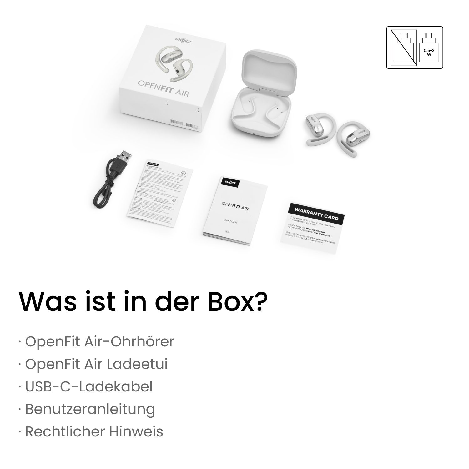 Eine weiße Box mit Ohrhörern, Ladeetui und Zubehör. Text auf Deutsch: 'Was ist in der Box?'