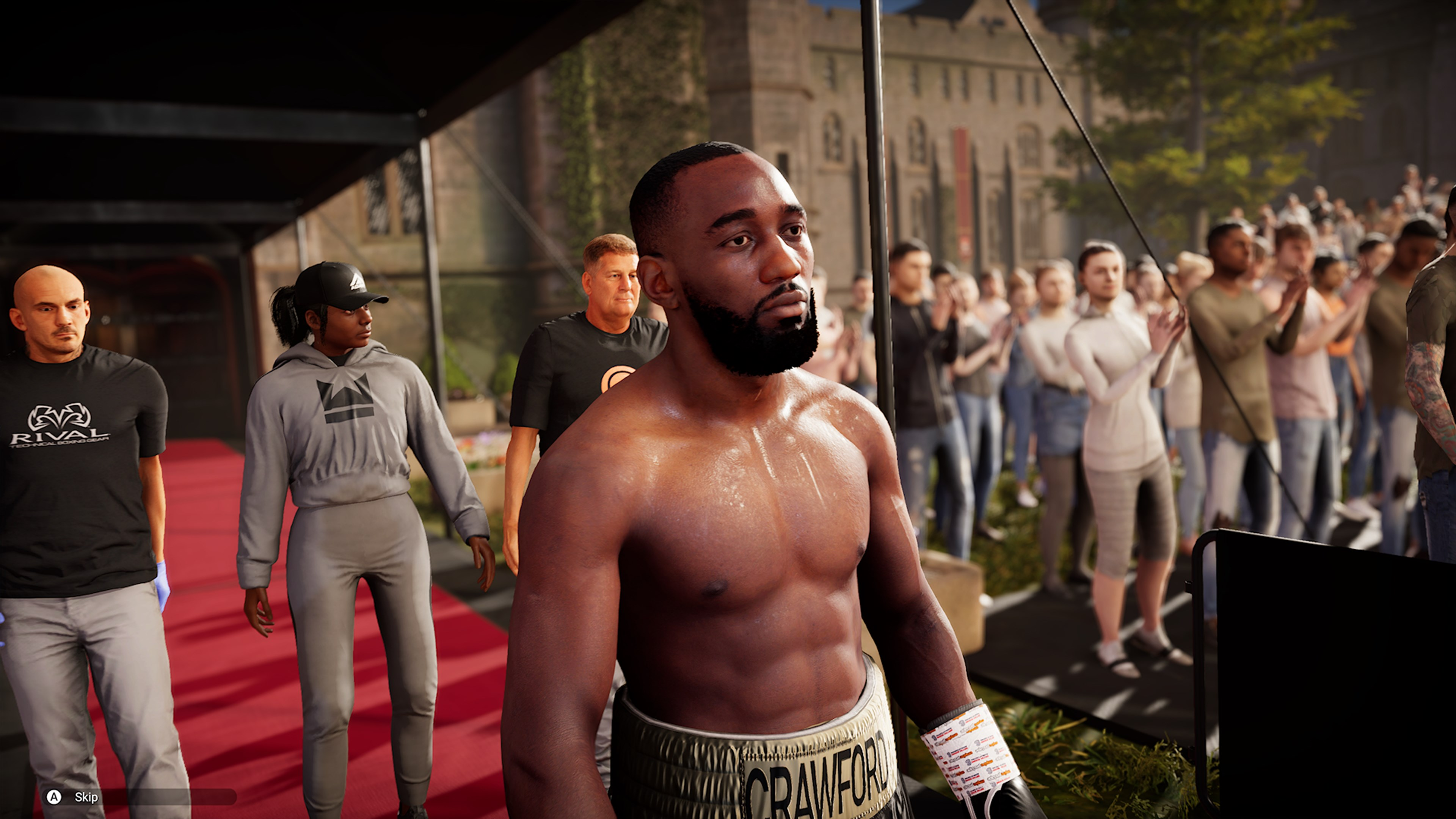 Boxeur entrant sur le ring avec son équipe et la foule. Tapis rouge, lumières vives, public en délire.