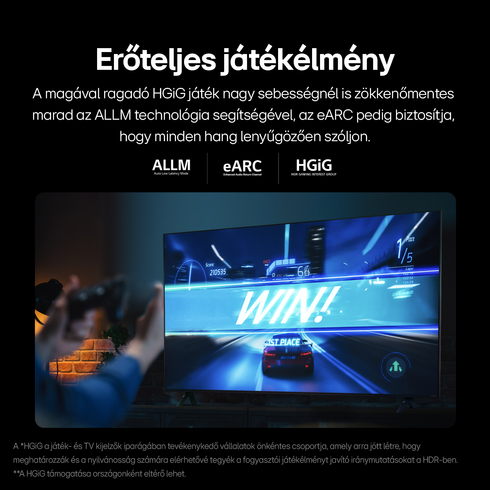A képernyőn egy autóverseny játék látható. Szövegek: NYERT!, 1. hely. A képernyő egy fekete TV-n van.
