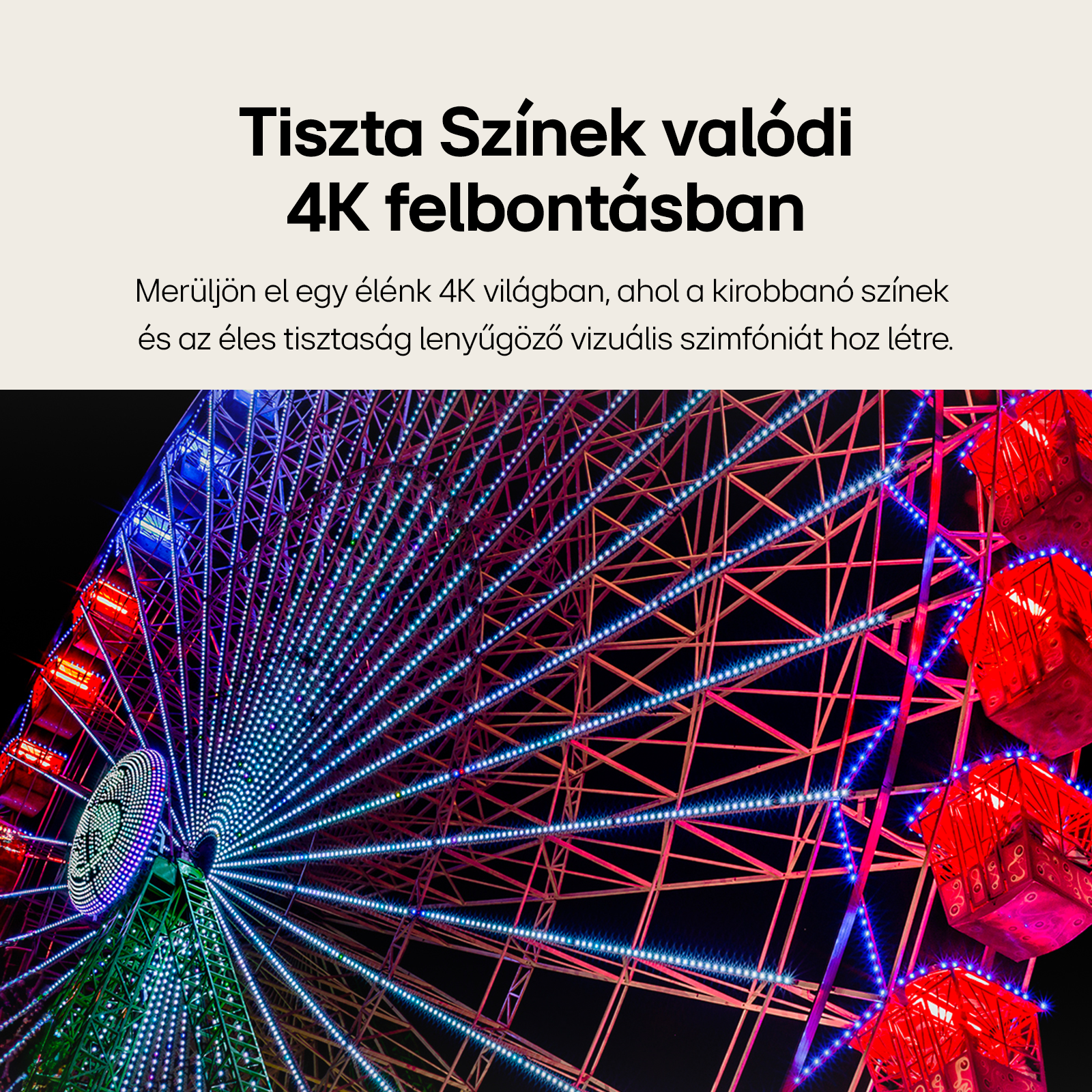 Éjszakai óriáskerék színes világítással. Az ég fekete.