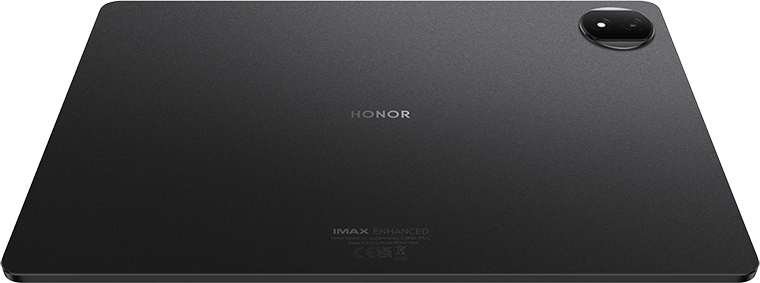 Fekete tablet hátulnézete HONOR és IMAX ENHANCED felirattal, sötét felületen.
