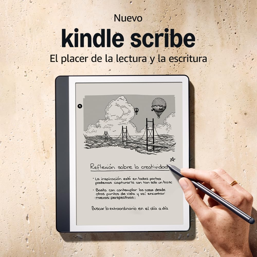 Una mano sosteniendo un bolígrafo para escribir en un Kindle Scribe. Un boceto de un puente y globos en la pantalla.