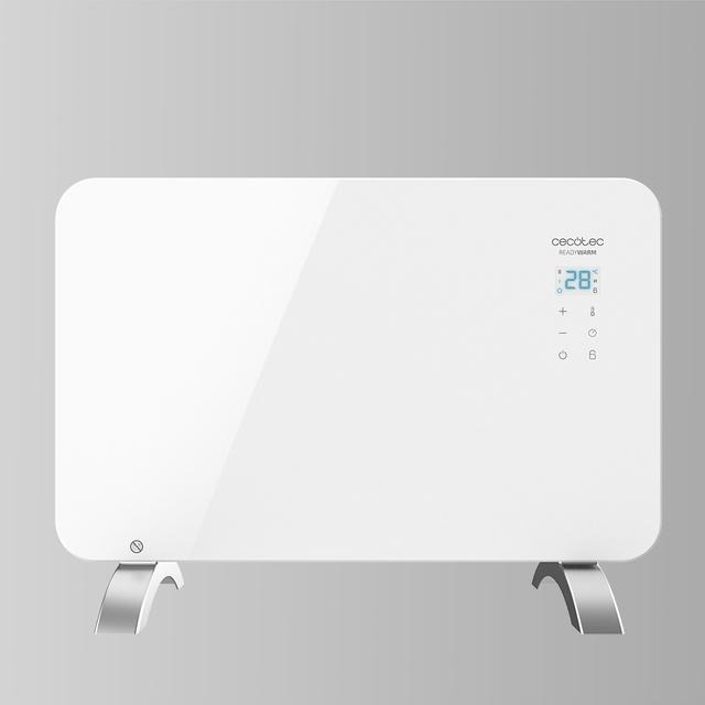 Calentador eléctrico blanco con pantalla digital que muestra 28 grados sobre fondo gris.