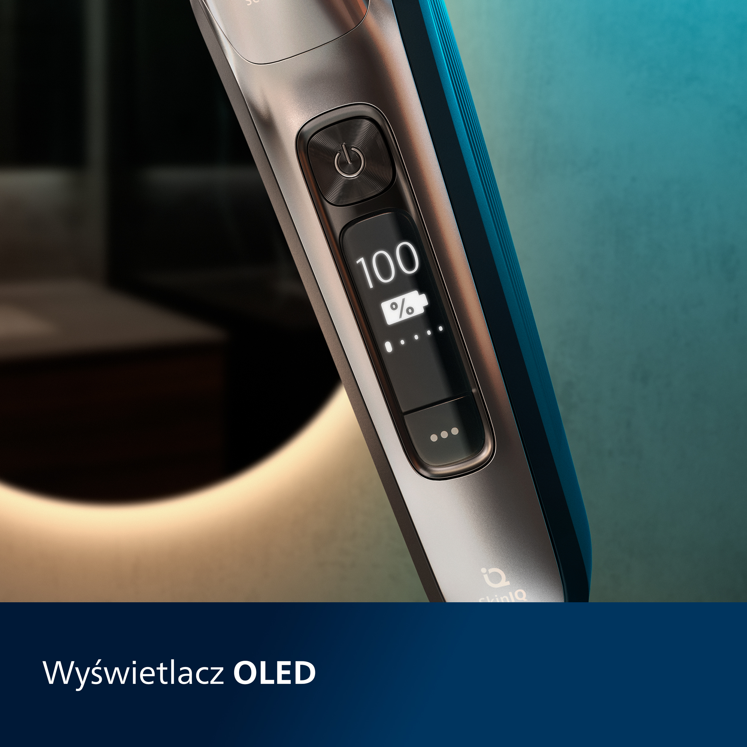 Zbliżenie golarki pokazujące wyświetlacz OLED i procent naładowania baterii.