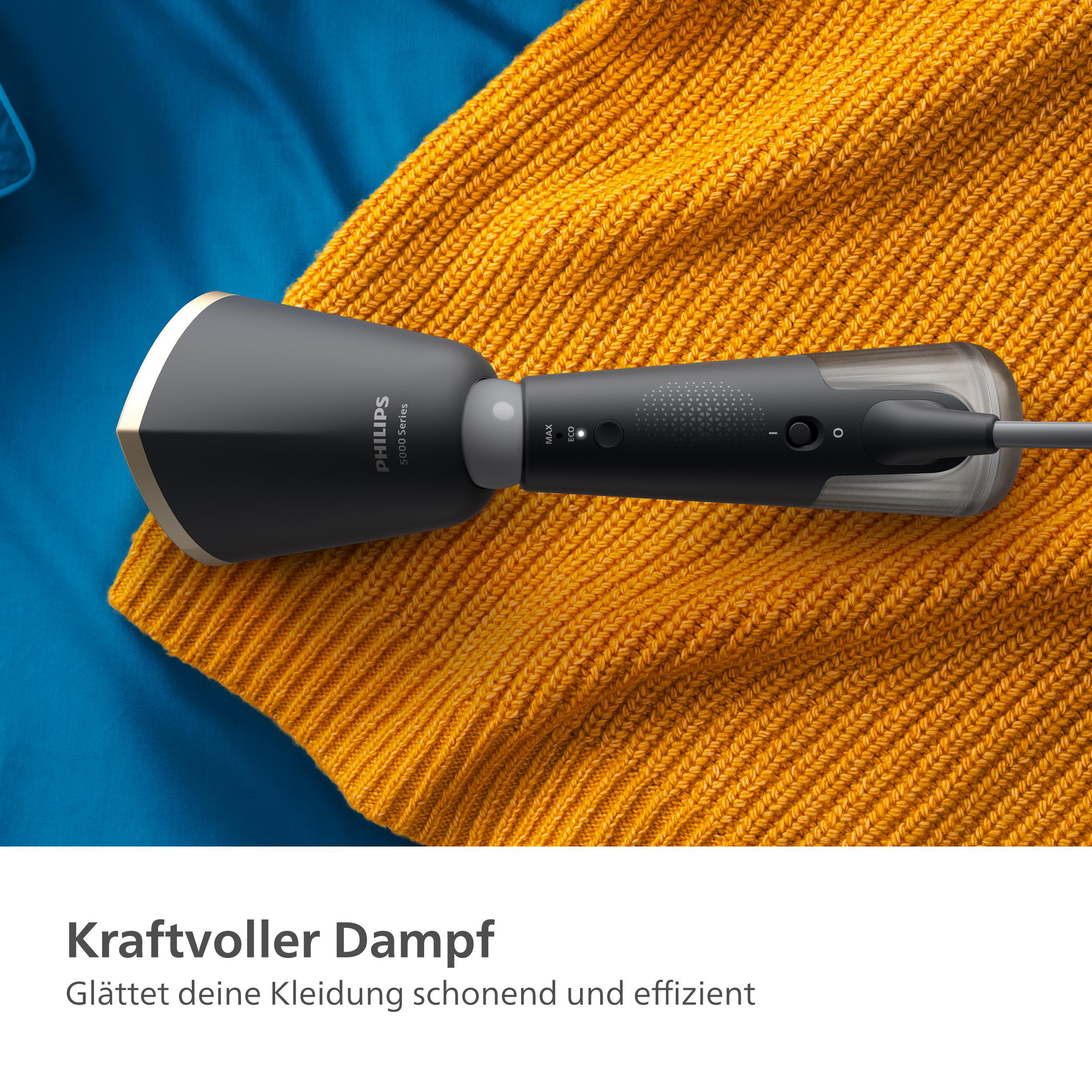 Ein schwarzer und grauer Philips-Dampfer über einem gelben Pullover.
