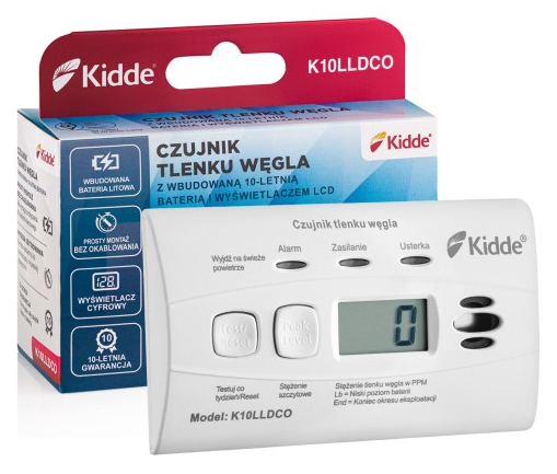 Biały czujnik tlenku węgla z LCD i przyciskami, przed pudełkiem.