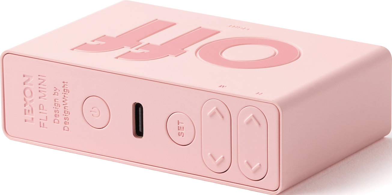Dispositivo rettangolare rosa con pulsanti e testo 'OFF'.