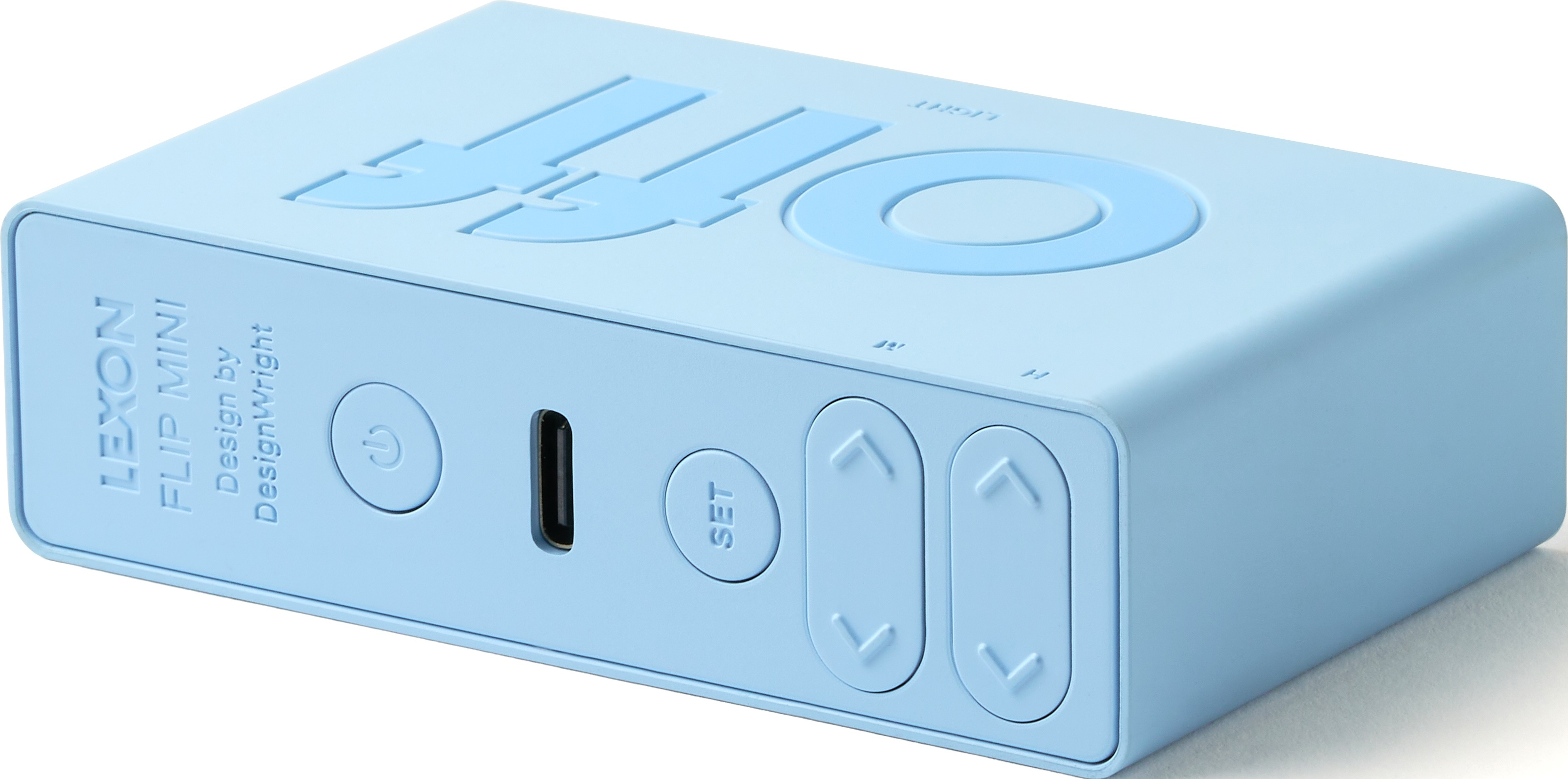 Una sveglia rettangolare azzurra con pulsanti e una porta USB.