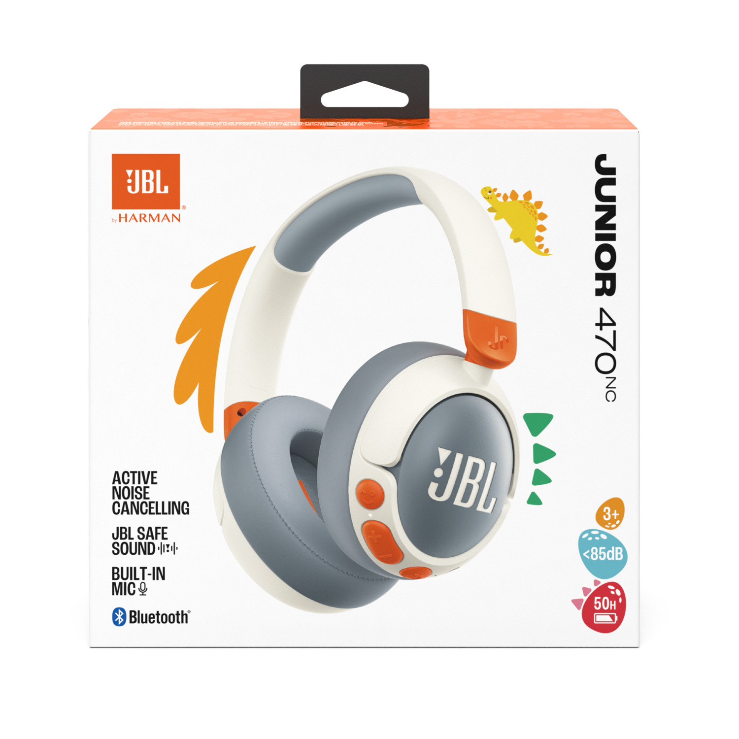 JBL Junior 470NC headphones in a box. The box is white and orange, with a dinosaur graphic and text.