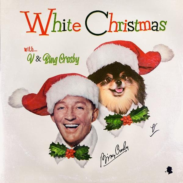 A "White Christmas" album borítója Bing Crosby-val és egy kutyával, mindketten mikulás sapkában. Szöveg és aláírások láthatók.