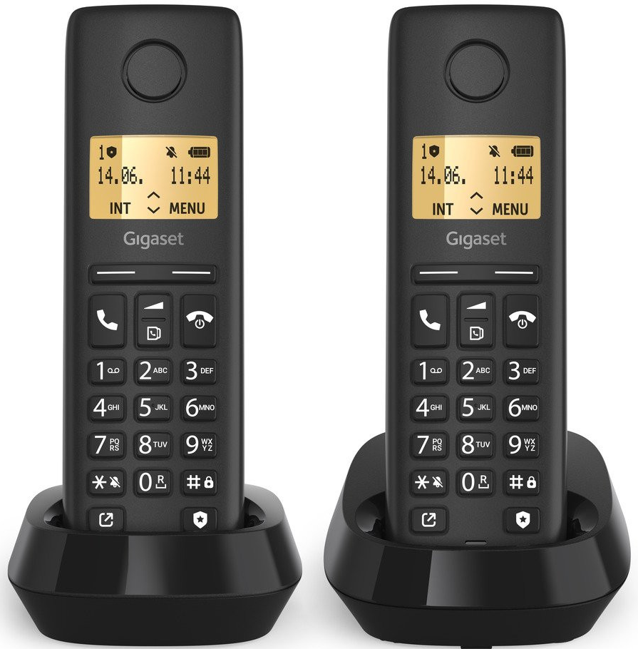 Két fekete Gigaset vezeték nélküli telefon töltőállomással, elölnézet.