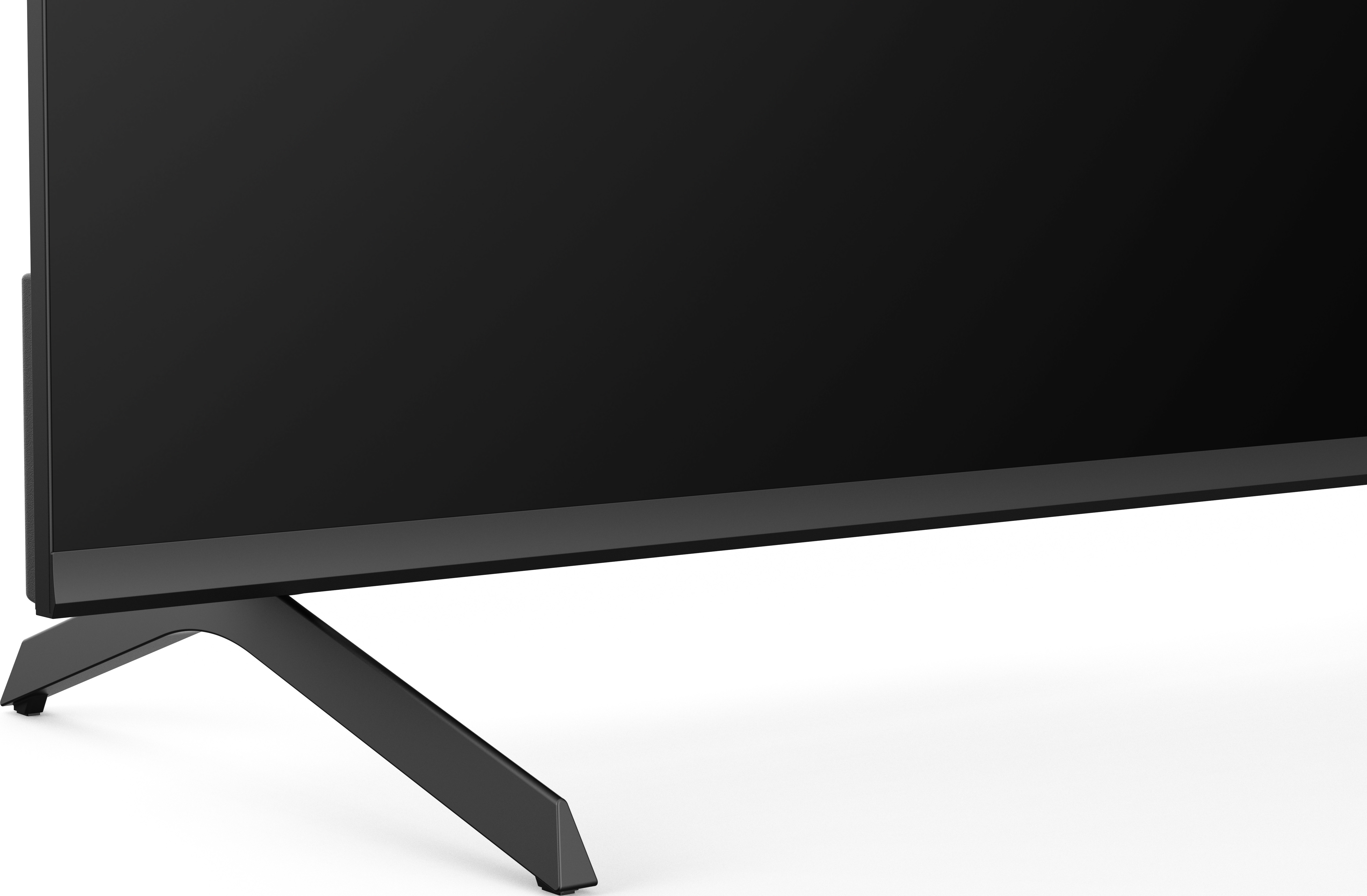 Écran de télévision noir avec un pied noir.