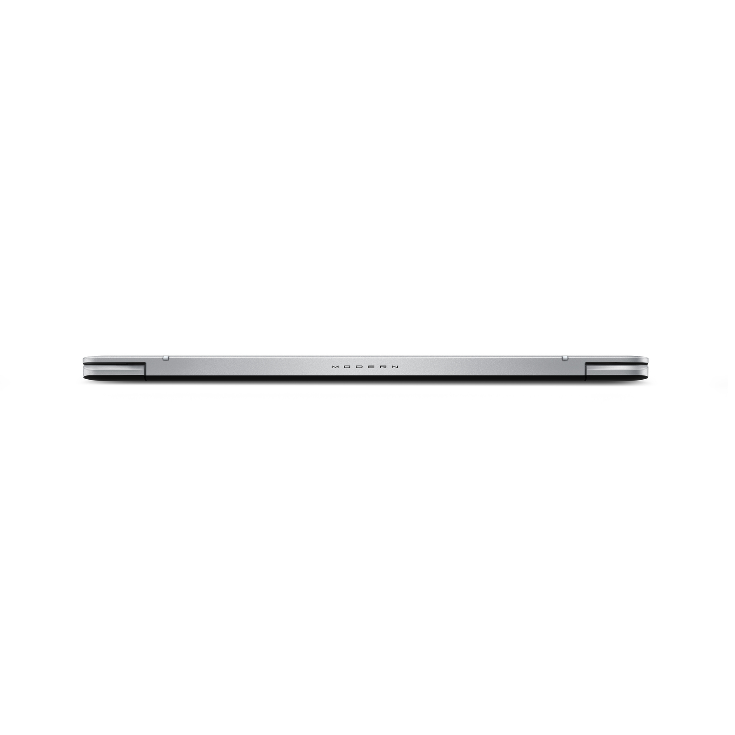 Silver laptop, seen from above. The word MODERN is visible. White background.