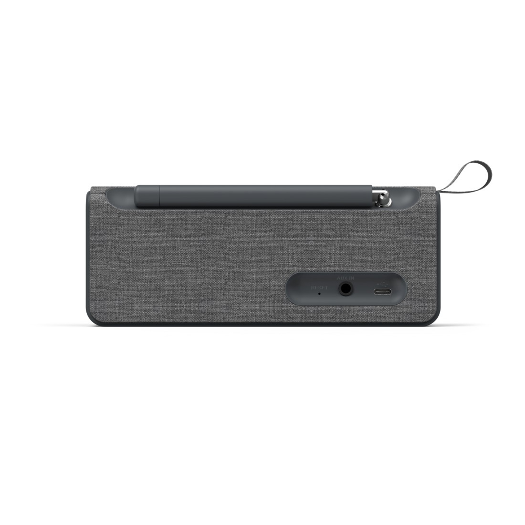Un altavoz gris oscuro con textura de tela, con un asa y puertos en la parte trasera.