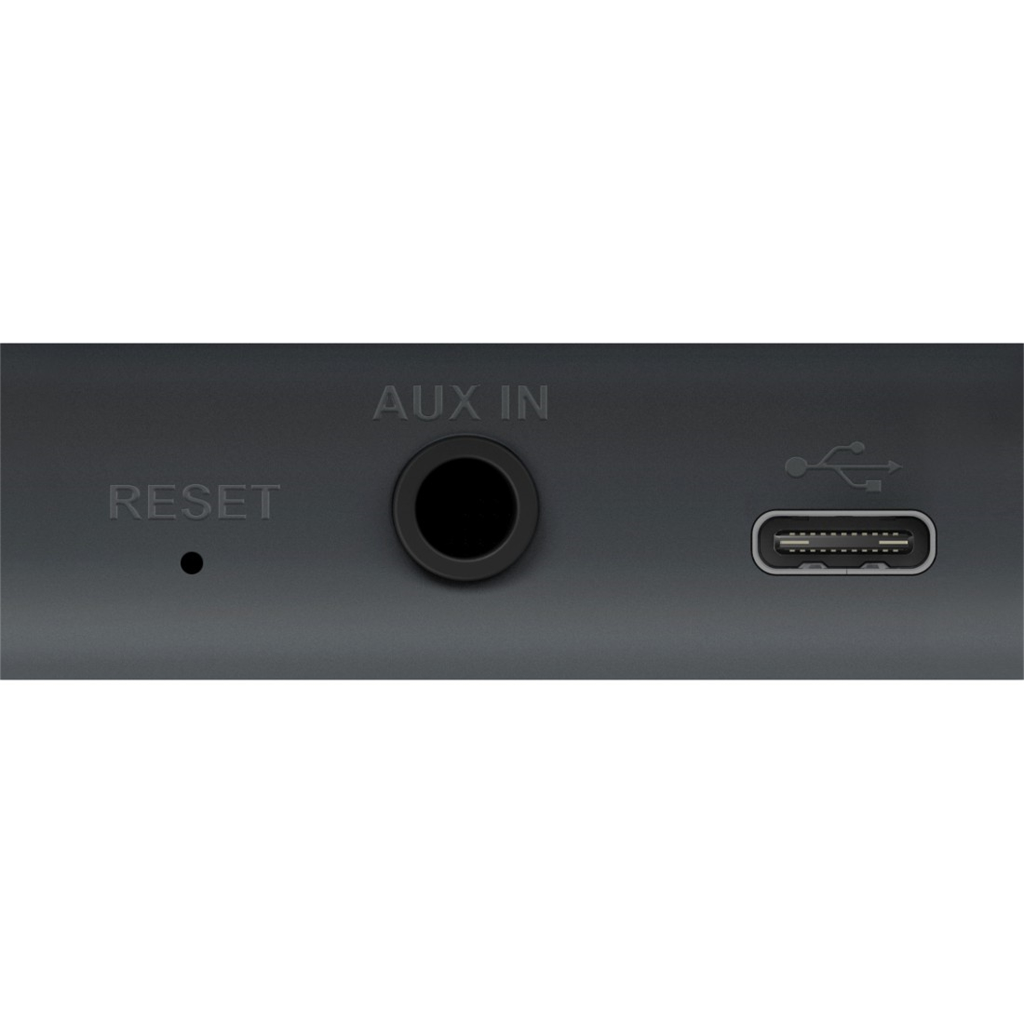 Puertos del dispositivo negro: reset, aux in y usb-c.