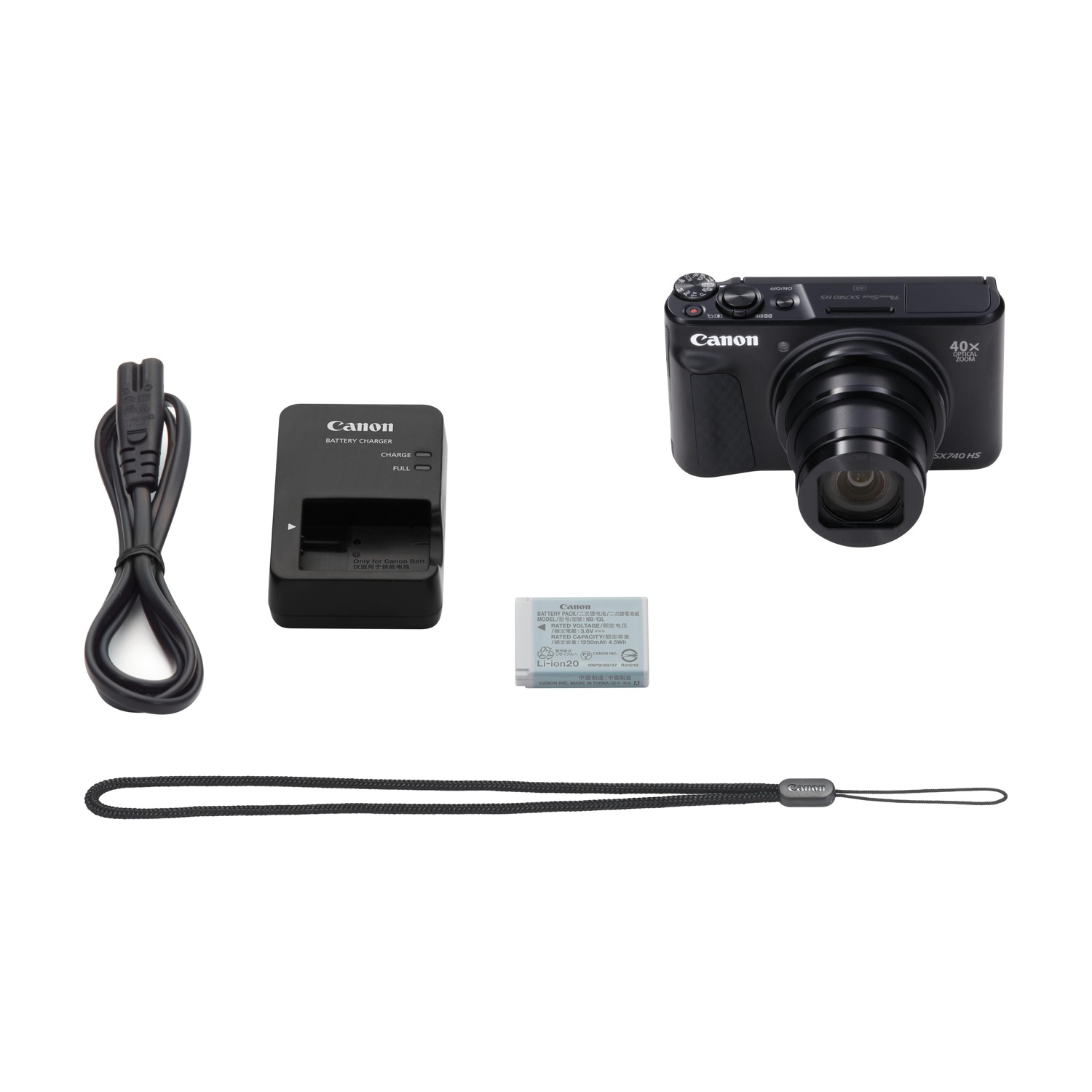 Un set fotocamera Canon con accessori come caricabatterie, batteria e cinturino.