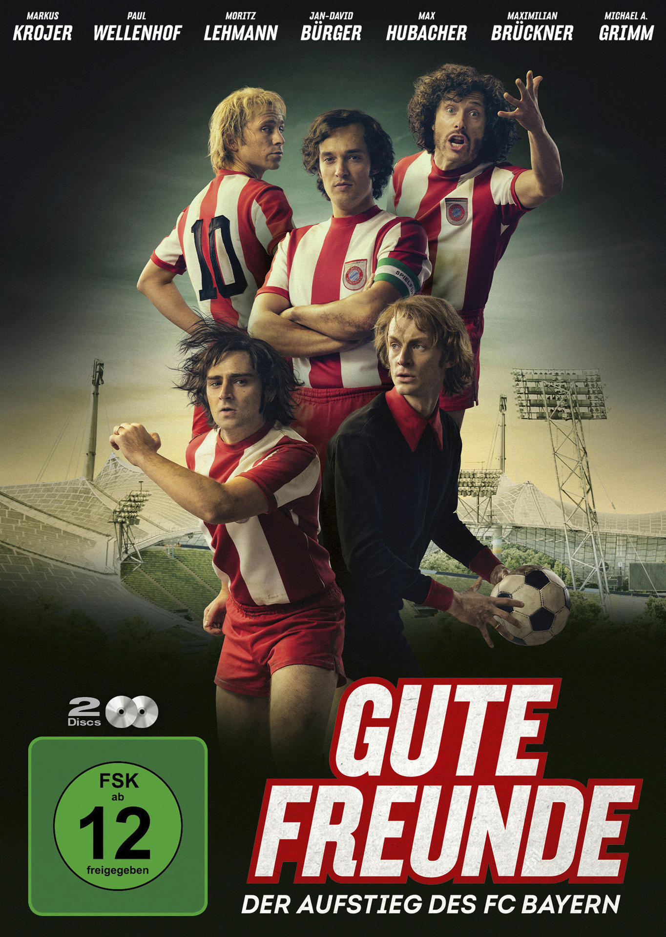 Filmplakat von 'Gute Freunde' mit Schauspielern in Fußballuniformen, Stadion im Hintergrund.