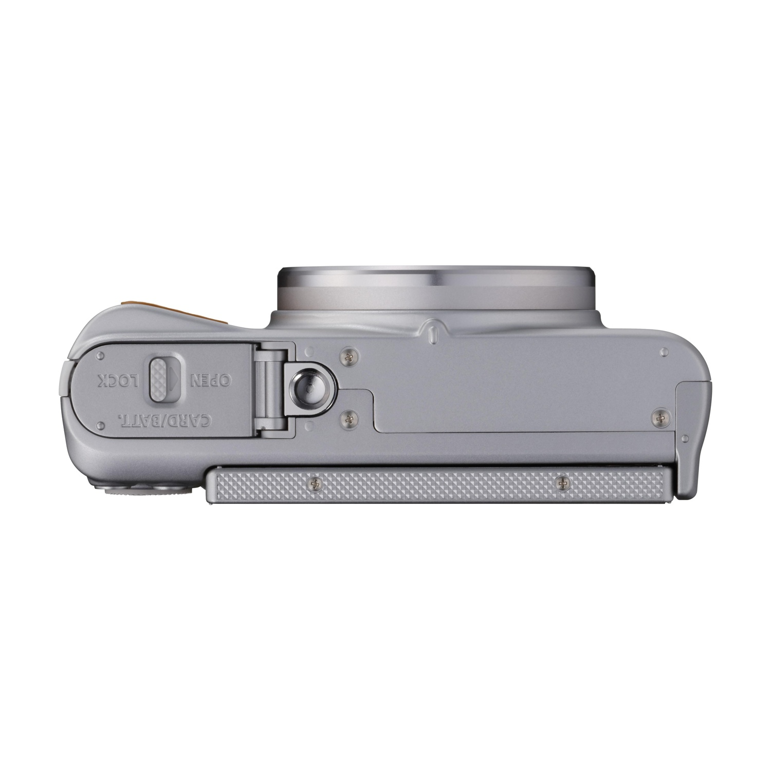 Fotocamera argentata dall'alto, con controlli e obiettivo. Su sfondo bianco.