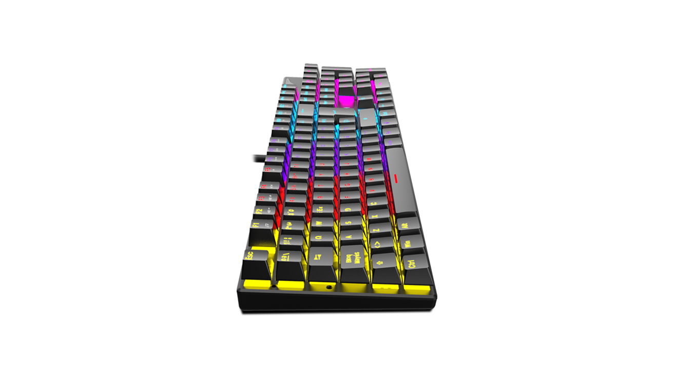 Un teclado mecánico negro con teclas iluminadas de colores, visto desde un ángulo bajo contra negro.